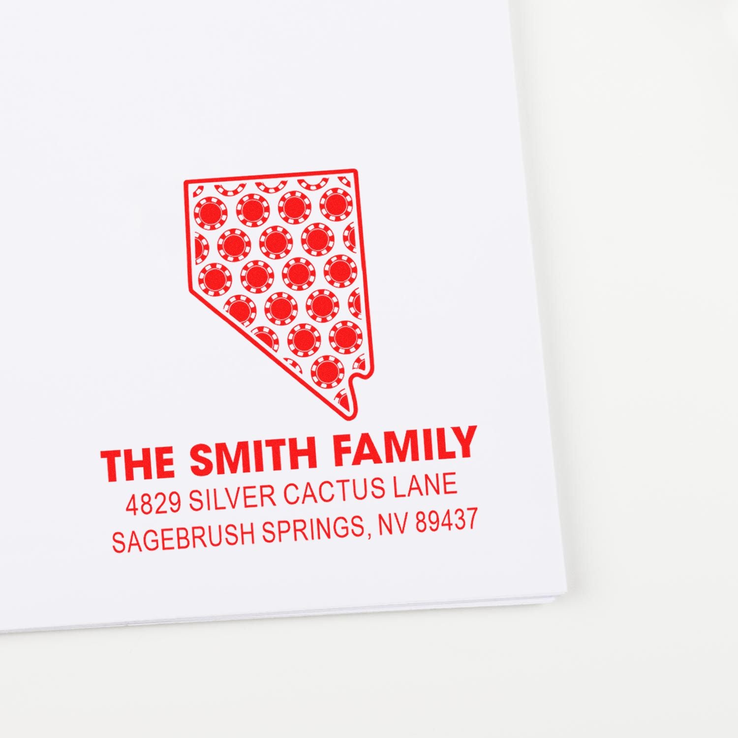 Custom Nevada return address rubber stamp with poker chip design for The Smith Family, Sagebrush Springs, NV.