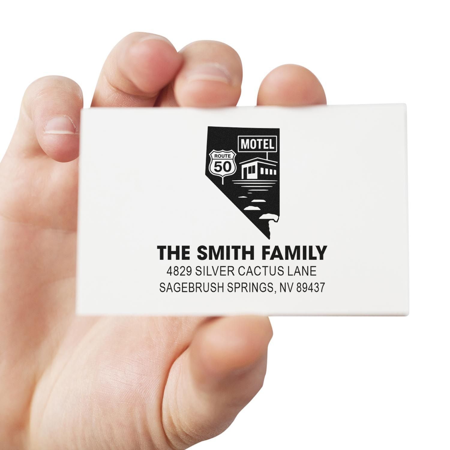 Custom rubber return address stamp for The Smith Family with Nevada Route 50 motel graphic and address.
