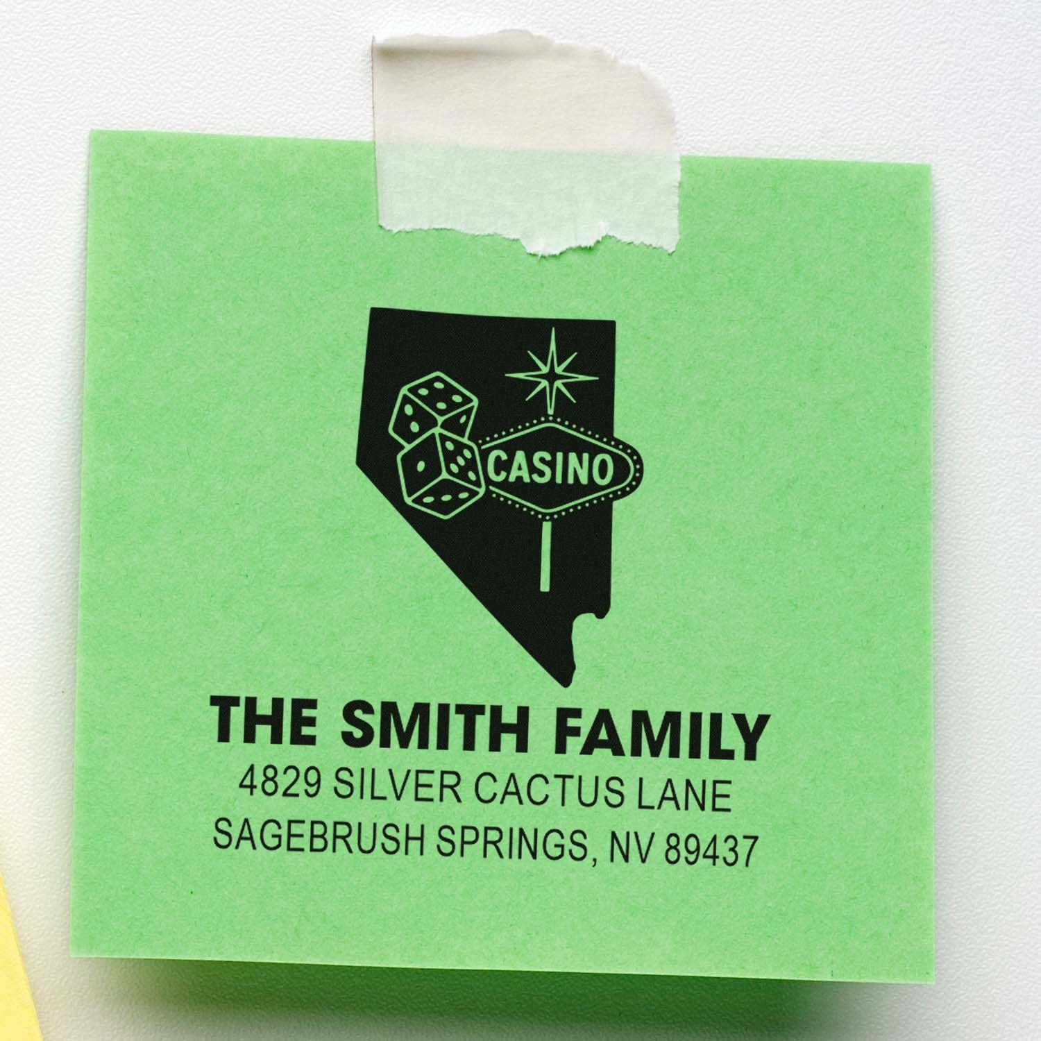 Casino-themed custom return address rubber stamp with Nevada logo, dice icon, and The Smith Family address.
