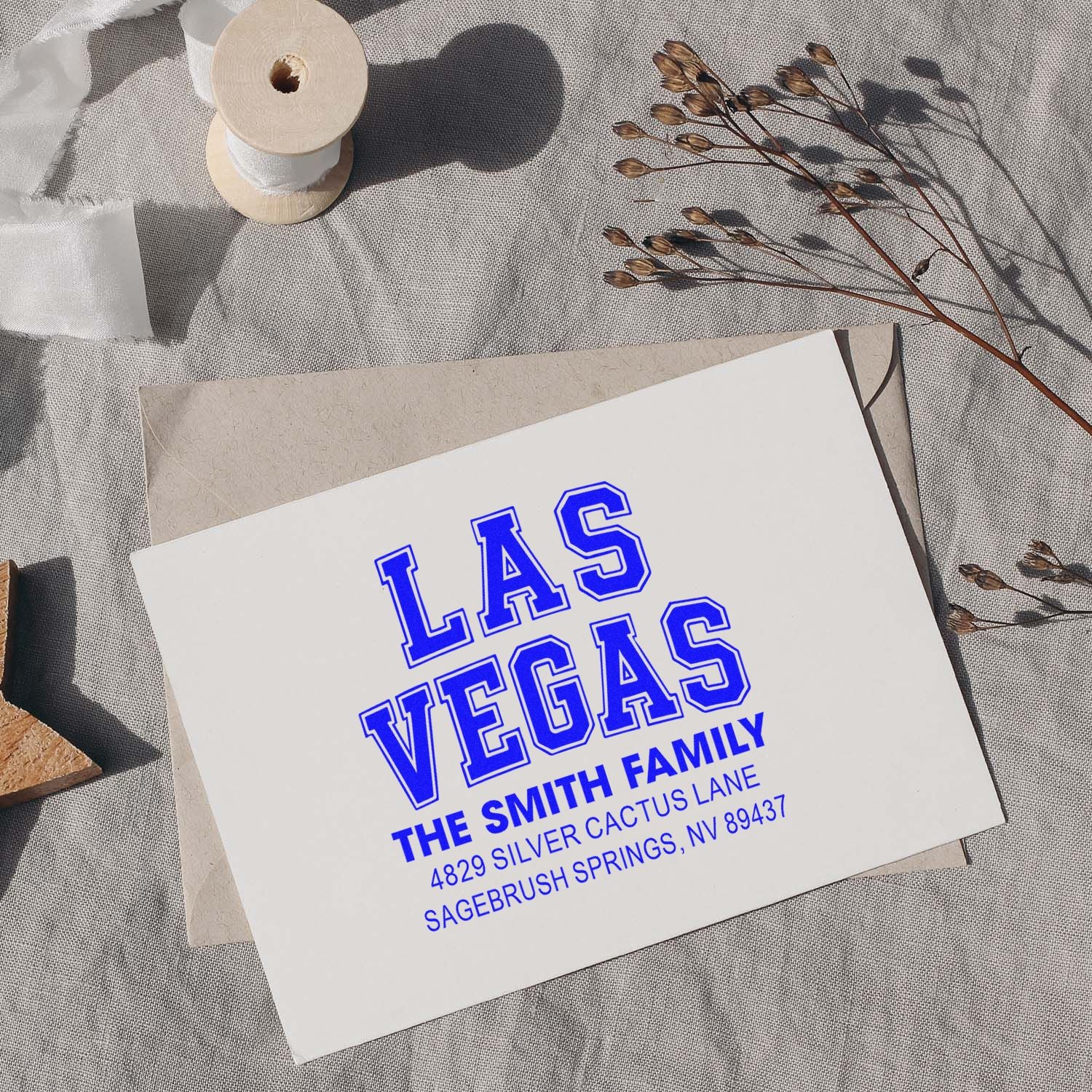 Personalized rubber address stamp for The Smith Family, Las Vegas, NV, shown on an envelope for custom stationery.