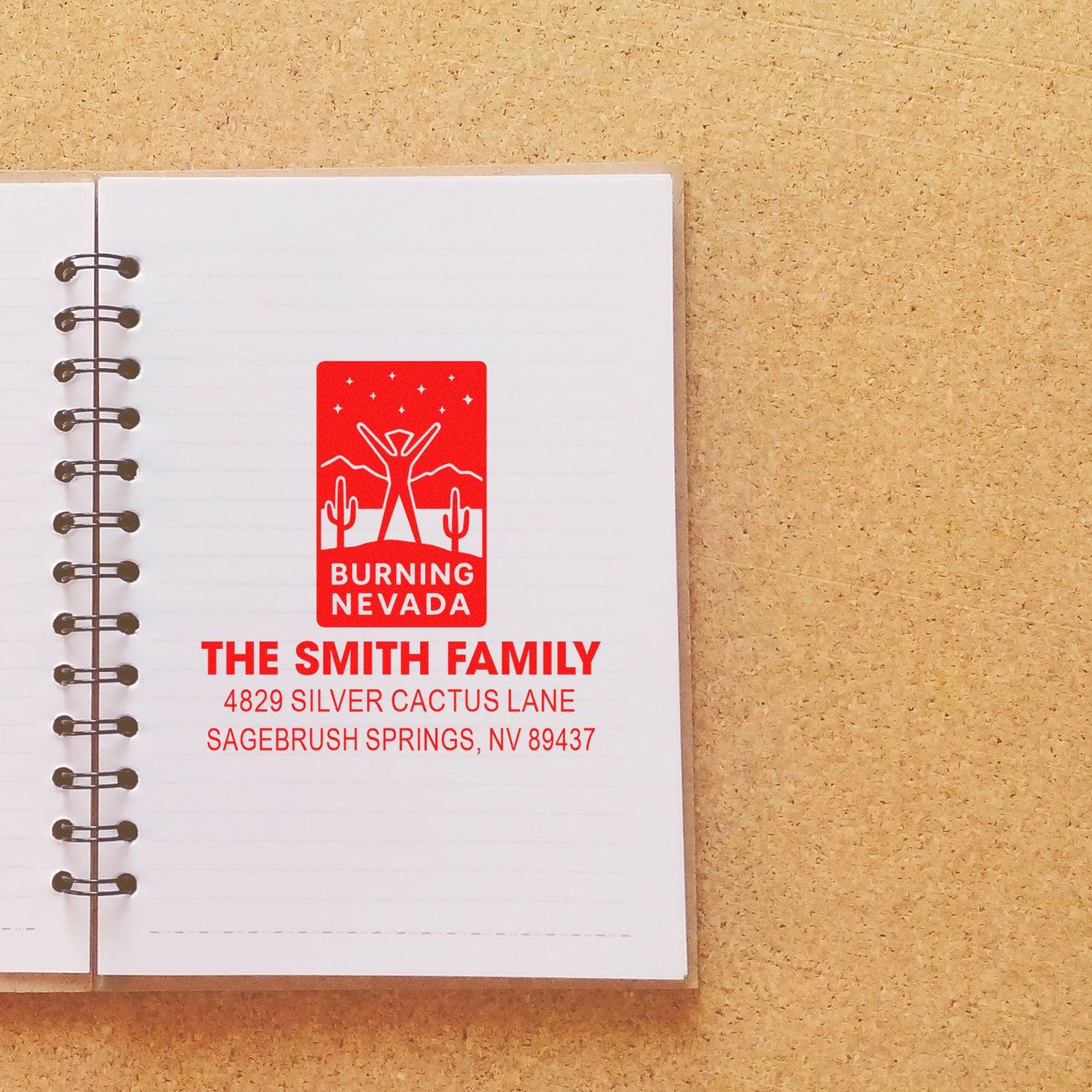 Custom Burning Nevada return address rubber stamp for The Smith Family, Sagebrush Springs, NV 89437.