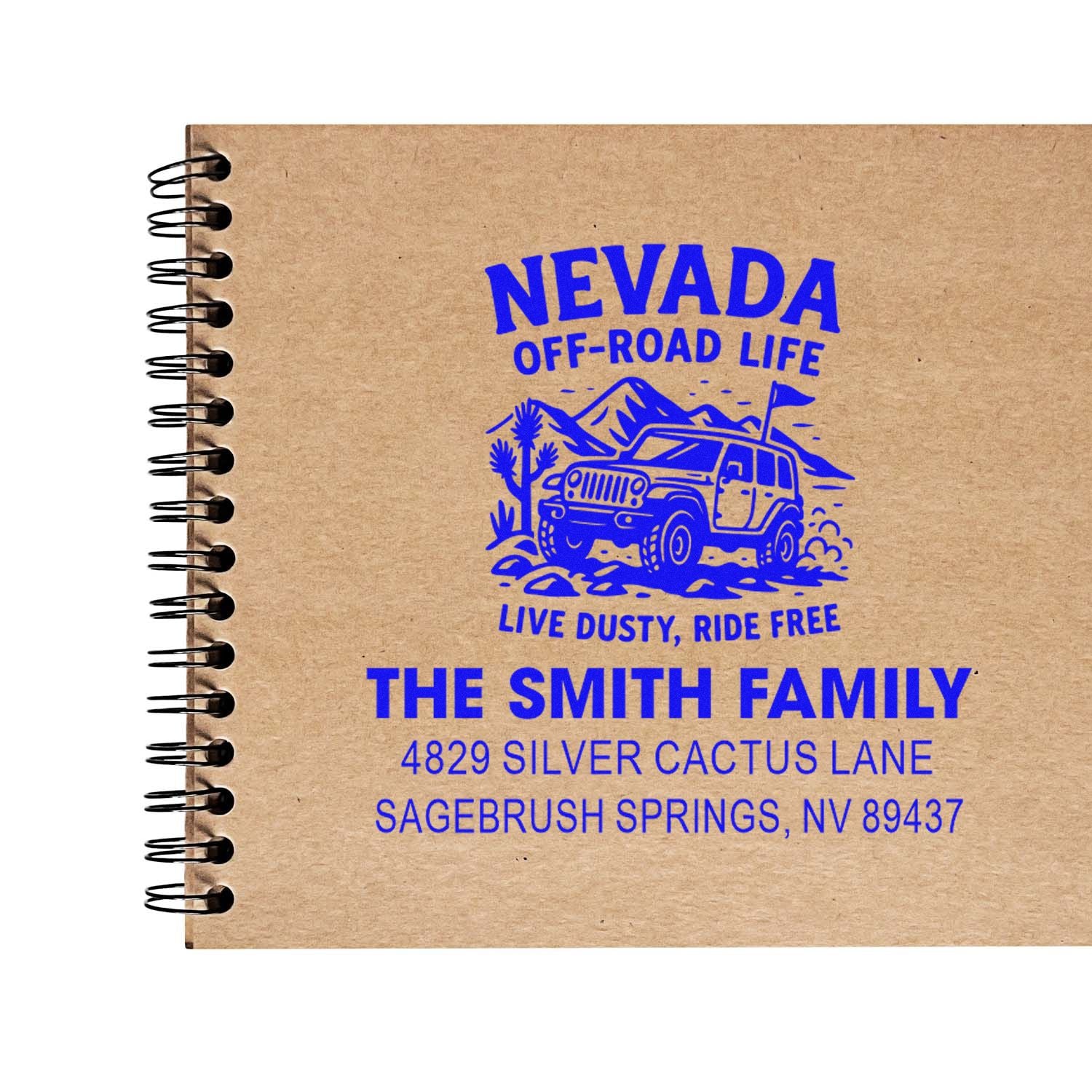 Custom rubber stamp for The Smith Family with Nevada off-road life design and personalized address on kraft notebook.