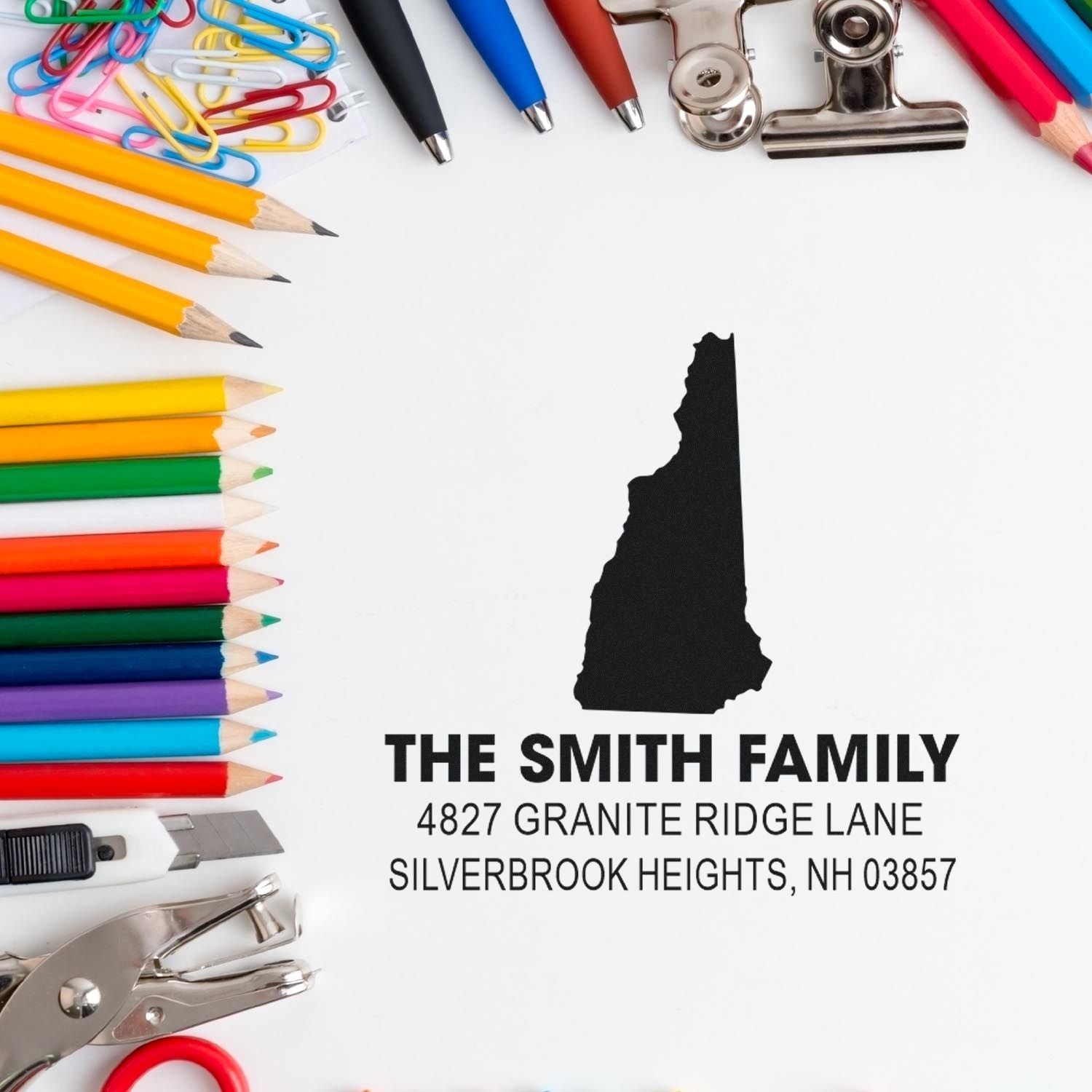 Custom return address rubber stamp with New Hampshire silhouette for The Smith Family mailing address.