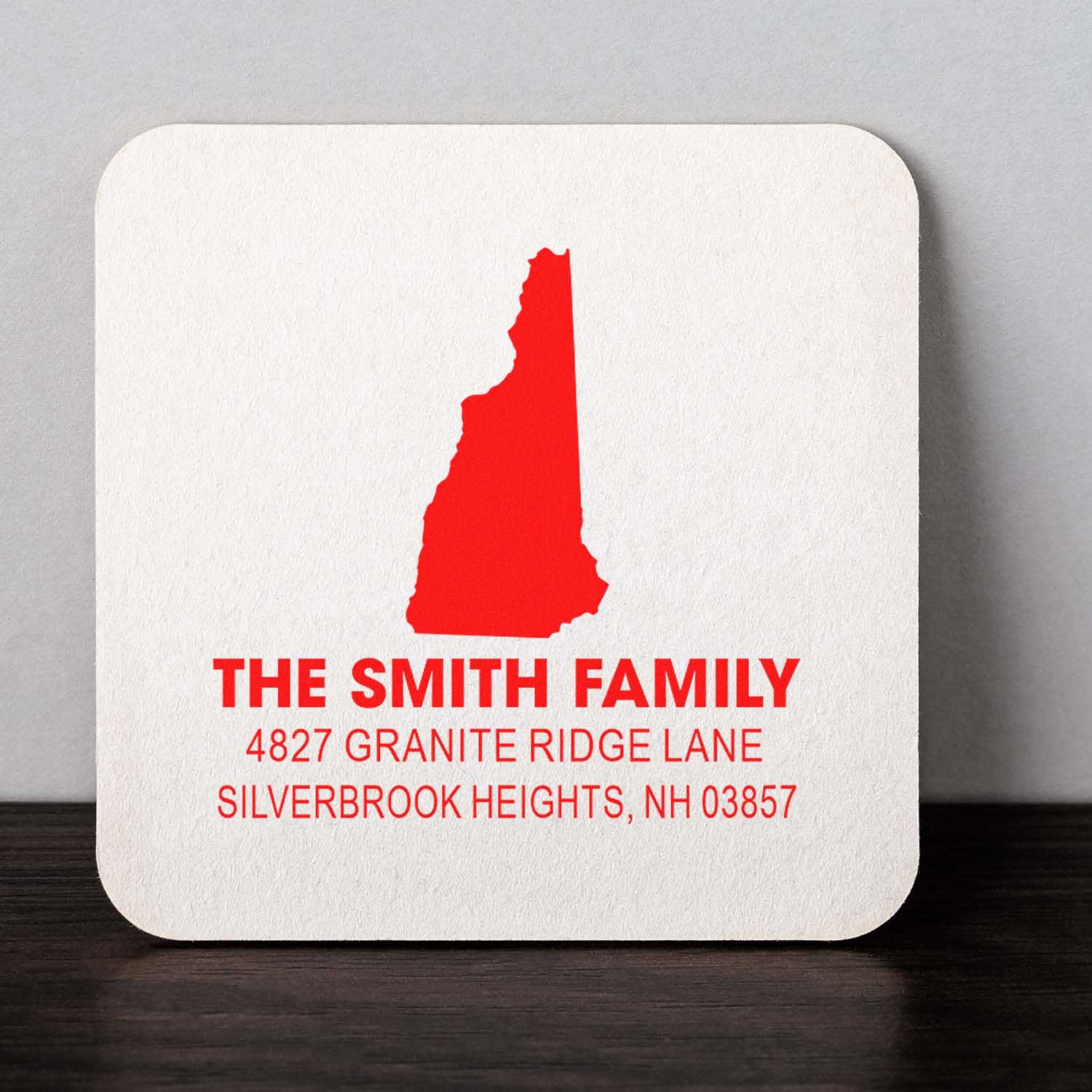 Custom New Hampshire return address rubber stamp for The Smith Family, with state silhouette and Silverbrook Heights address