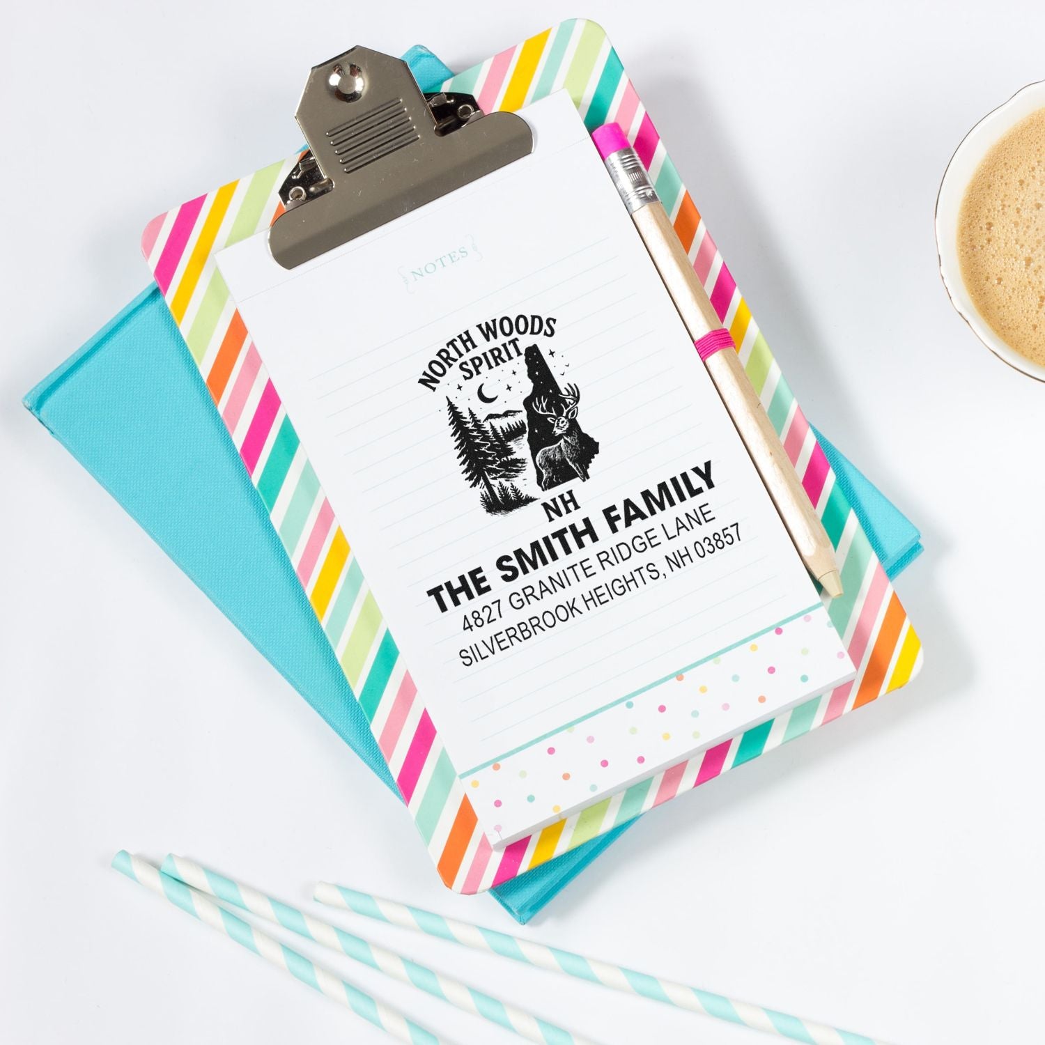 Personalized family return address rubber stamp impression on notepad, ideal for custom stationery and mailing.