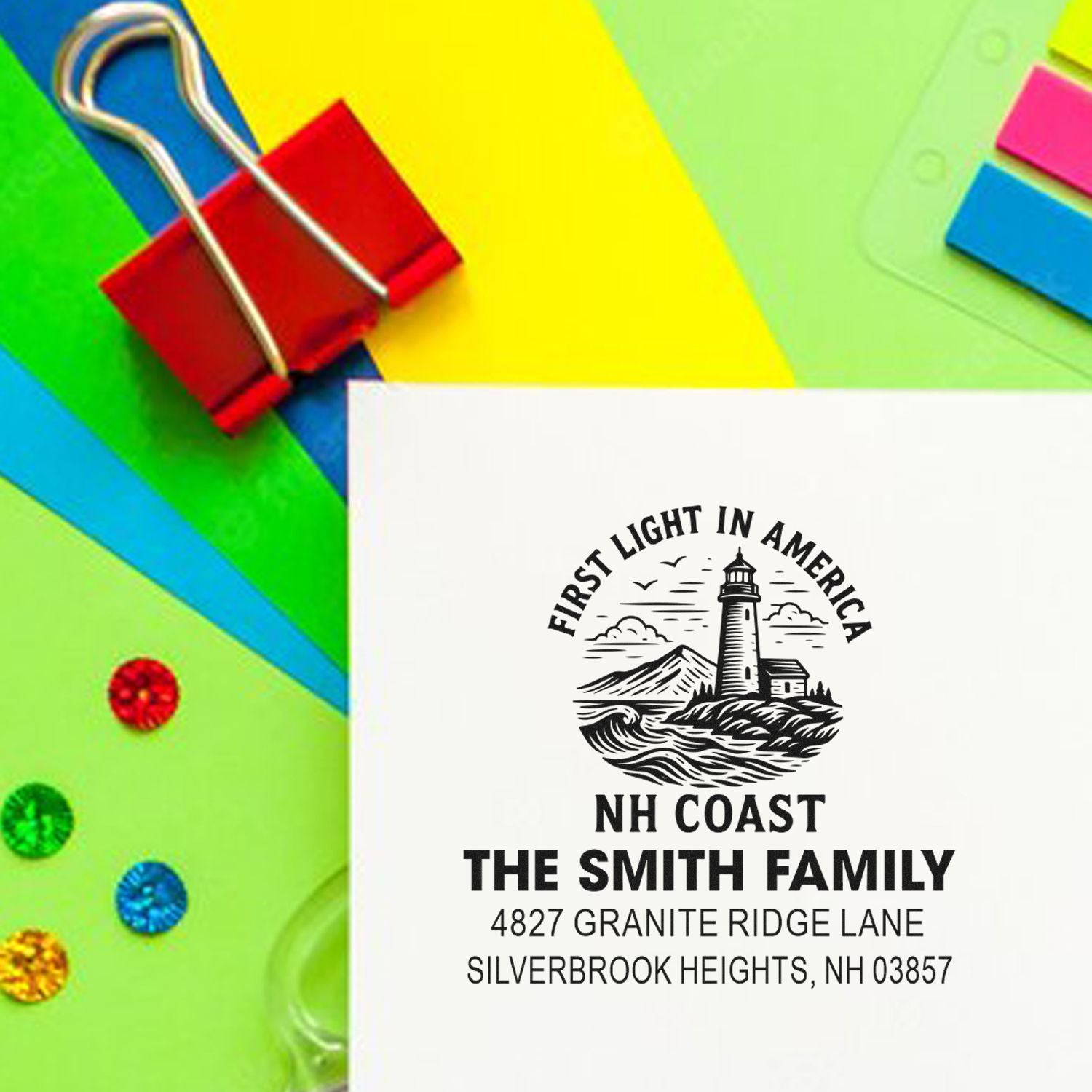 Custom rubber address stamp with lighthouse design for The Smith Family, NH Coast, and return mailing address.