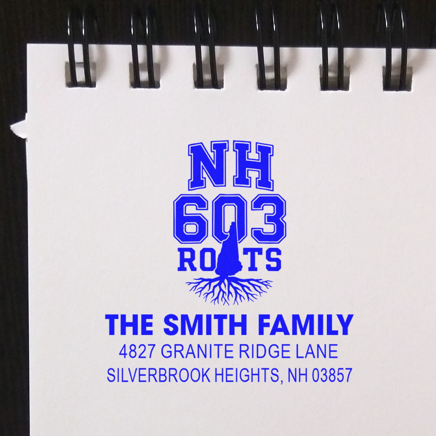 Personalized rubber stamp for The Smith Family, NH 603 Roots return address, Silverbrook Heights, NH 03857.