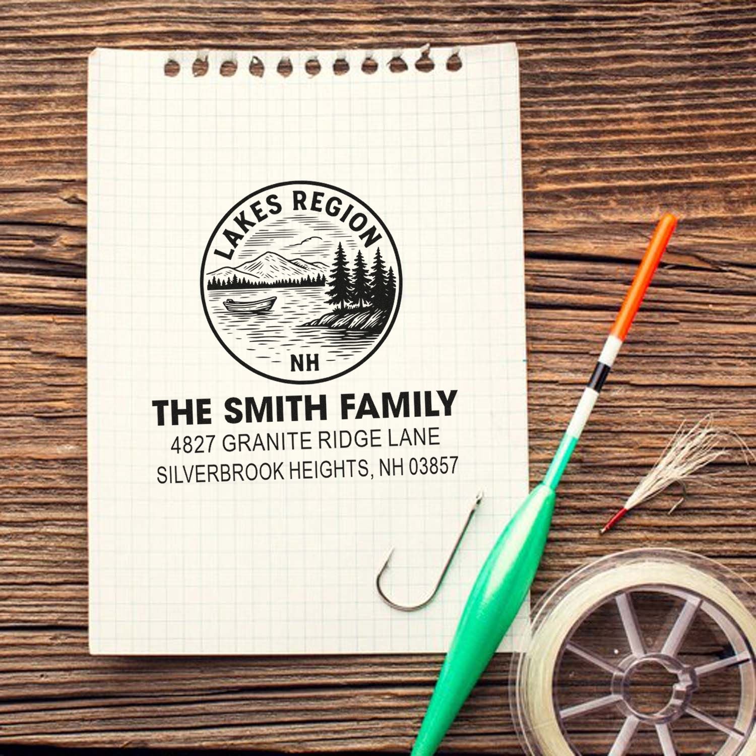 Custom address rubber stamp for The Smith Family, featuring a Lakes Region NH mountain lake design and return address imprint.