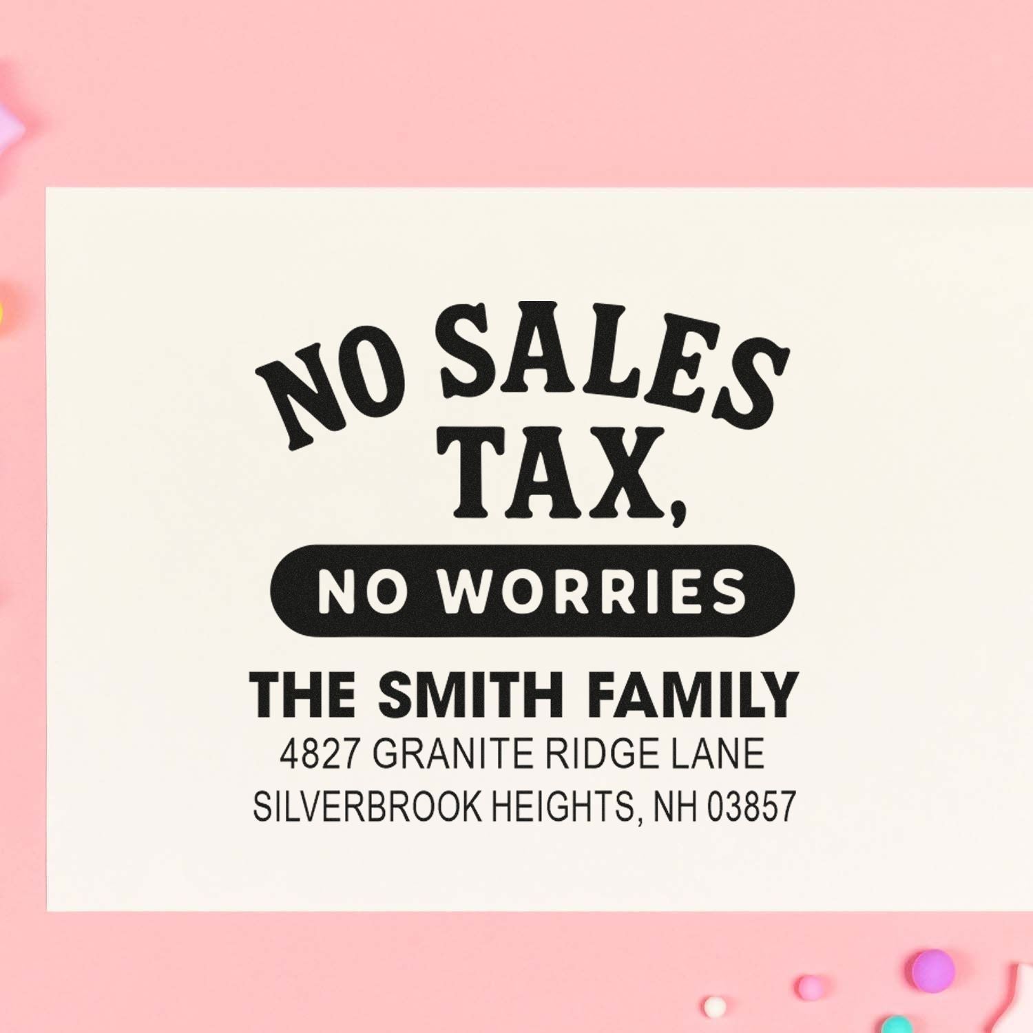 Custom return address rubber stamp with No Sales Tax, No Worries slogan for The Smith Family mailing labels.