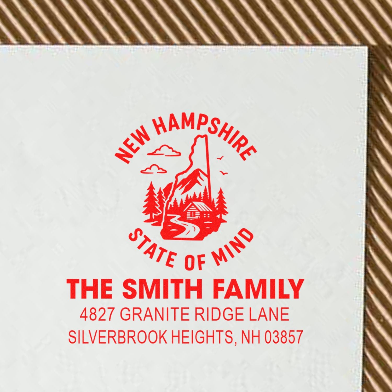 Custom rubber stamp with New Hampshire State of Mind design and The Smith Family return address, Silverbrook Heights, NH.
