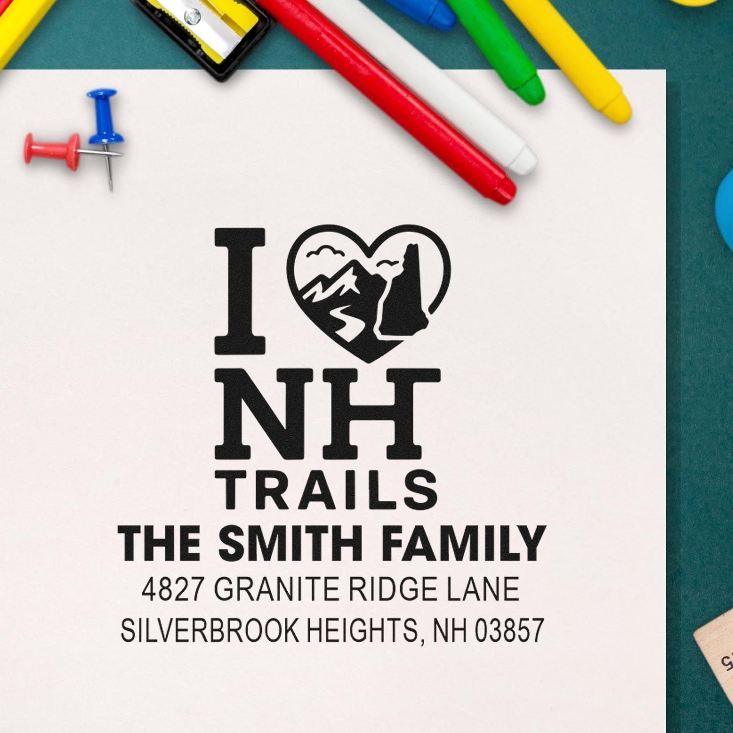 Custom New Hampshire trails return address rubber stamp for The Smith Family, with I love NH design and Silverbrook Heights address.