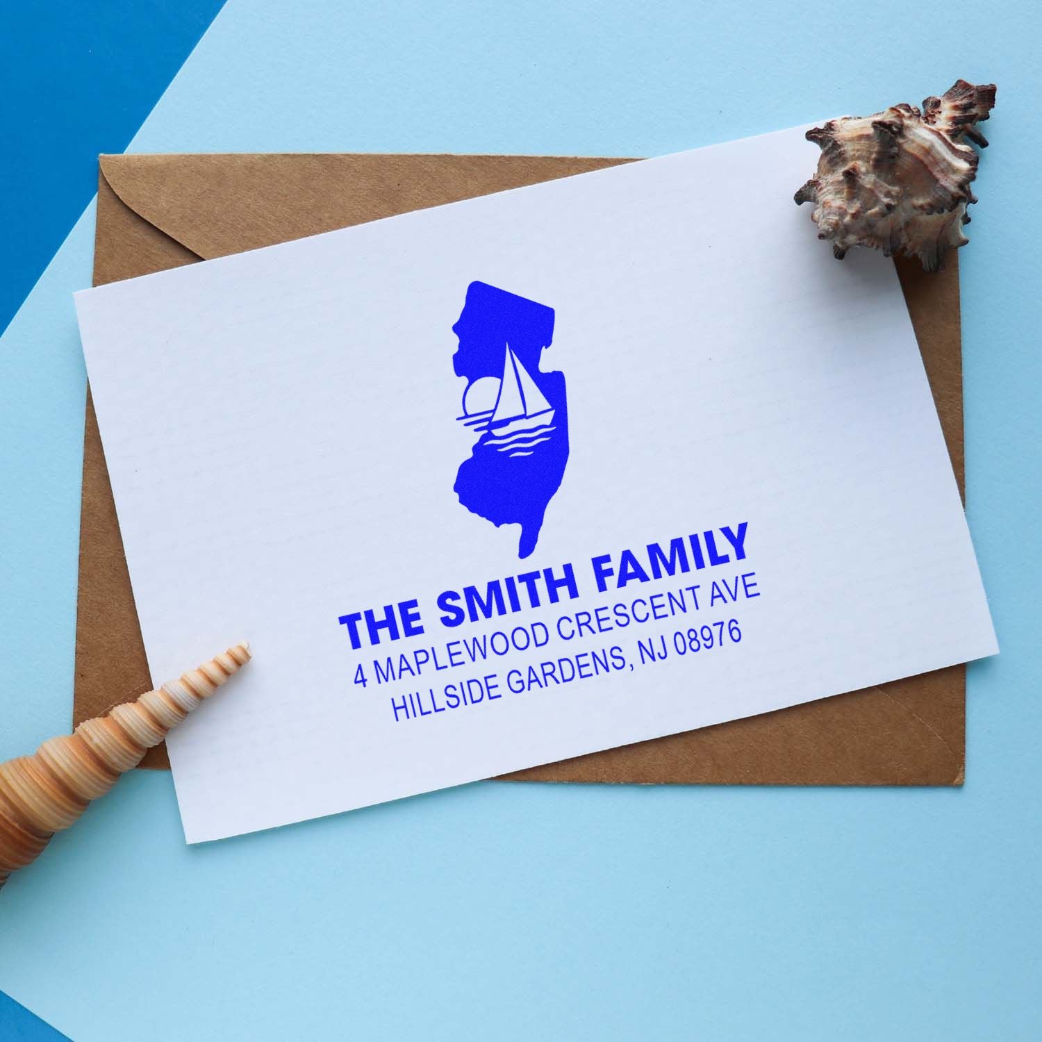 Custom return address rubber stamp with New Jersey sailboat design on envelope for personalized mailing and stationery.
