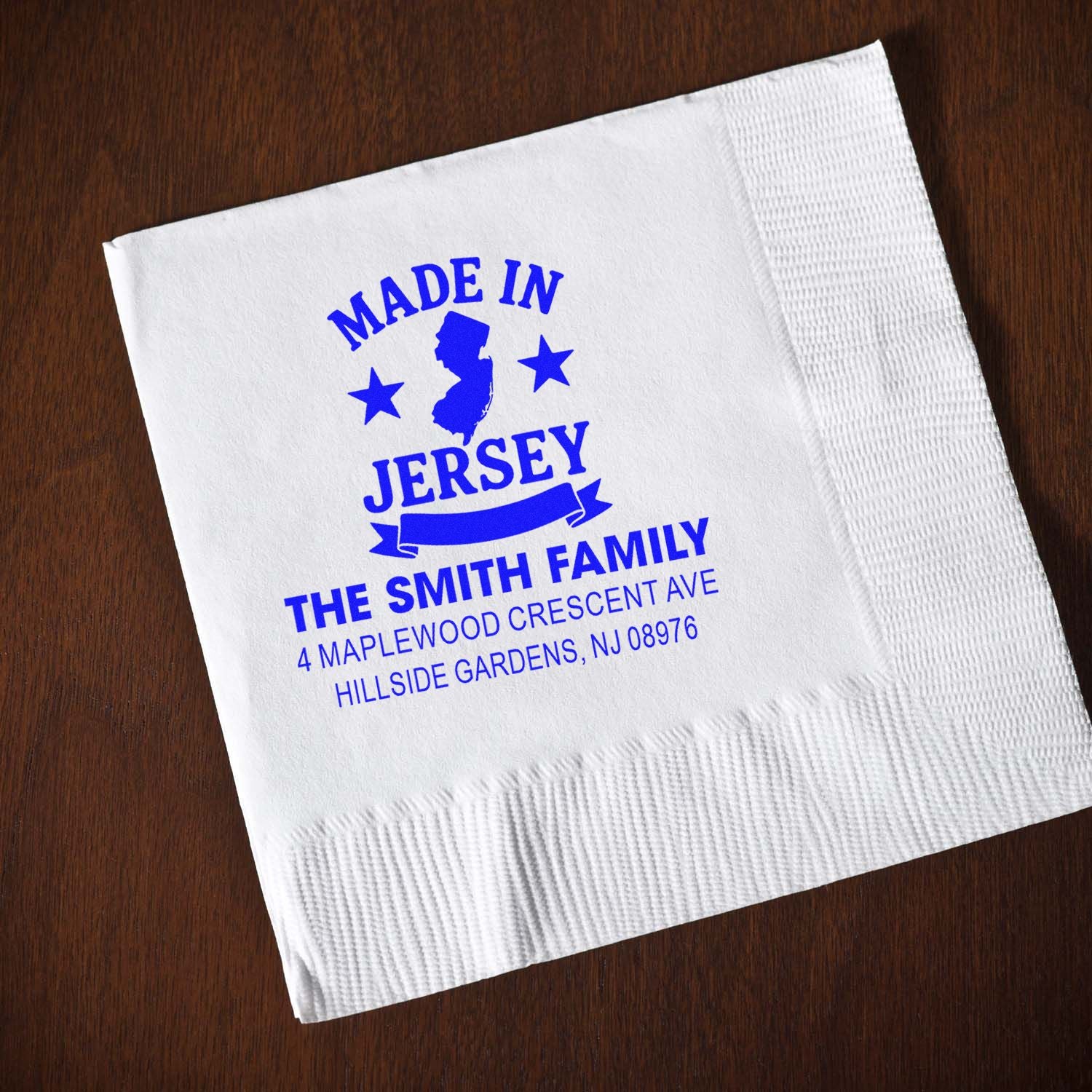 Custom rubber stamp imprint on napkin: Made in Jersey Smith family return address design for personalized stationery.