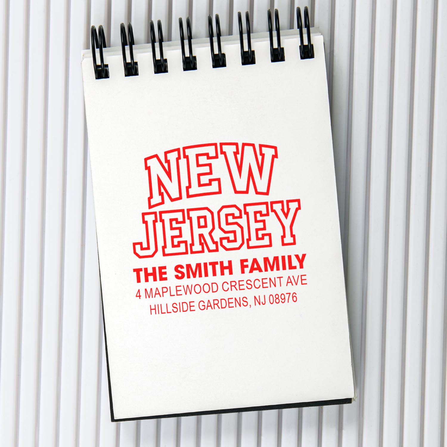 Personalized New Jersey return address rubber stamp for The Smith Family with custom name and address.