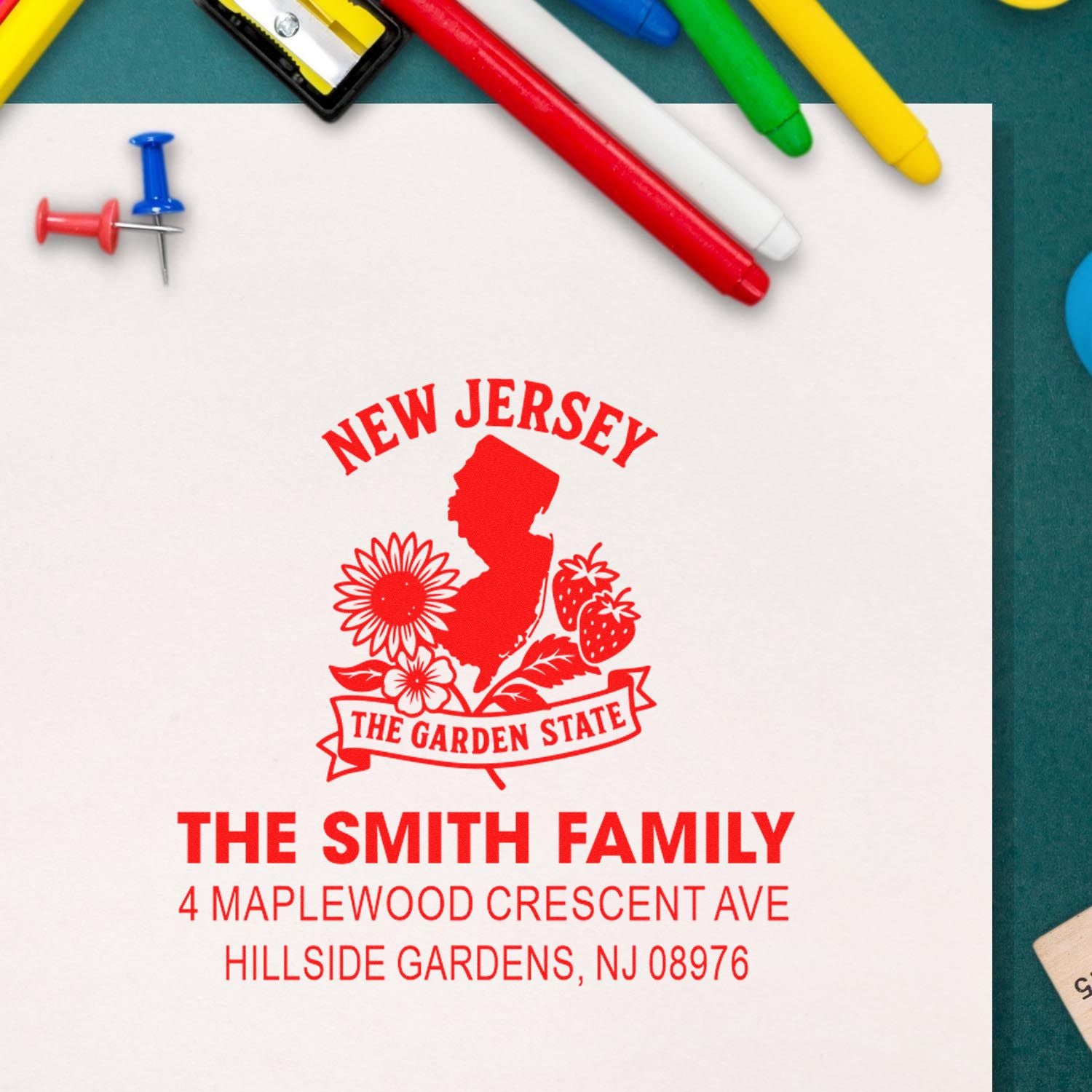 Personalized custom rubber return address stamp for The Smith Family in Hillside Gardens, NJ, with New Jersey logo.