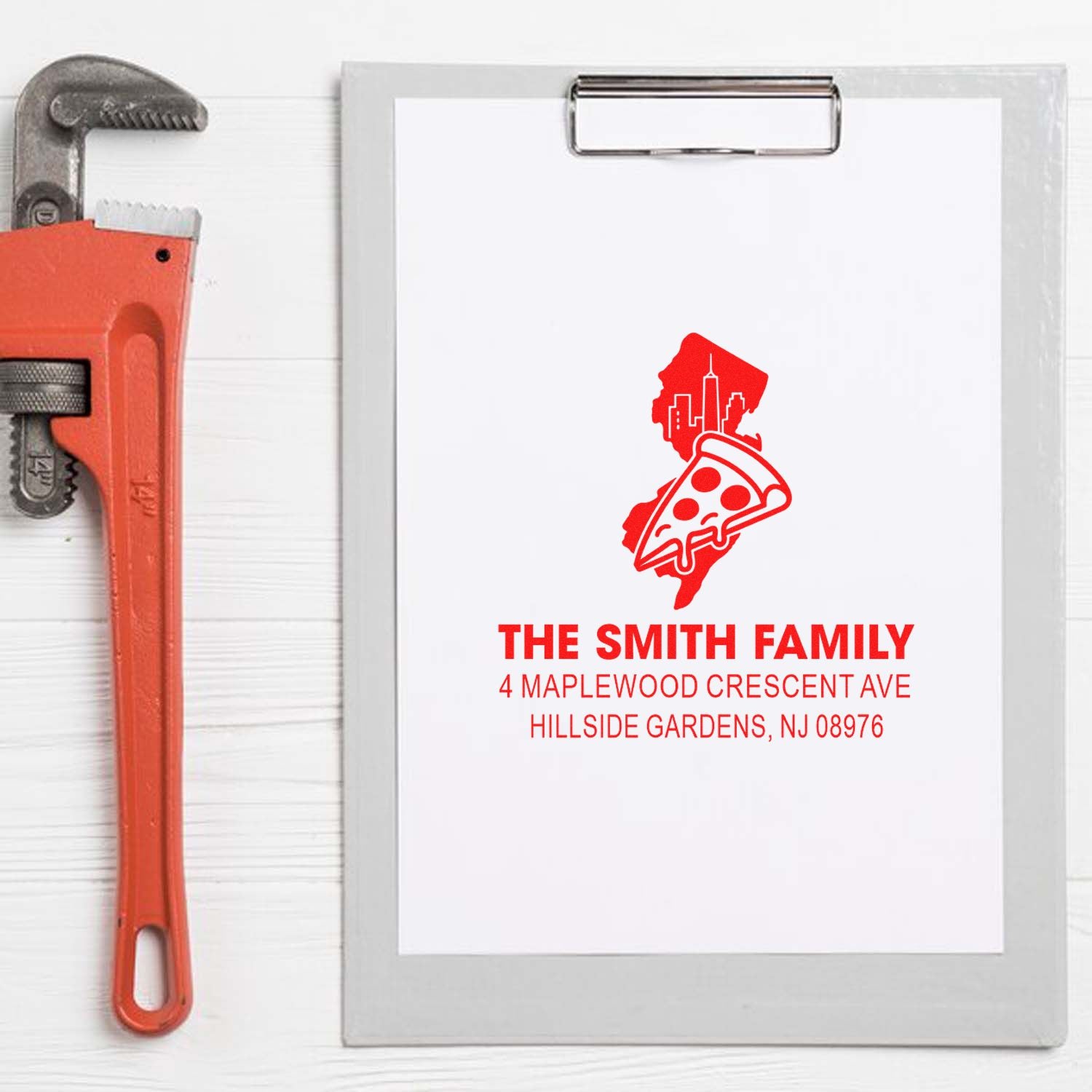 Custom family address rubber stamp with pizza-themed house logo and personalized return address for mail and packaging.