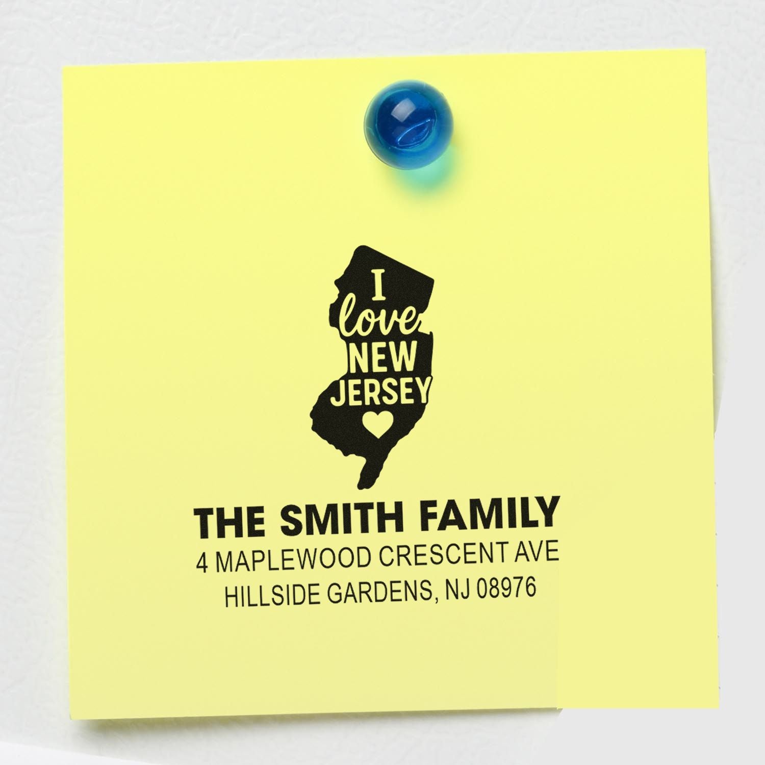 Custom rubber address stamp with I Love New Jersey design and family name for personalized mailing.