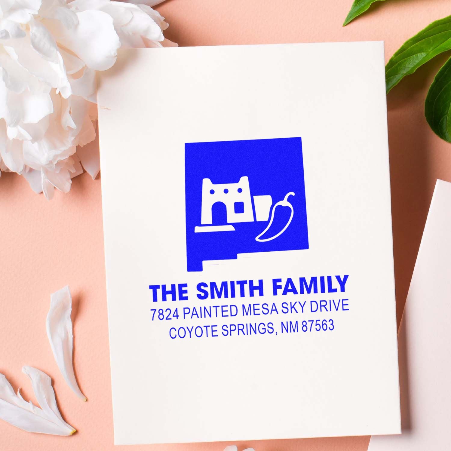 Custom rubber return address stamp for the Smith family, featuring house icon and Coyote Springs, NM mailing address.