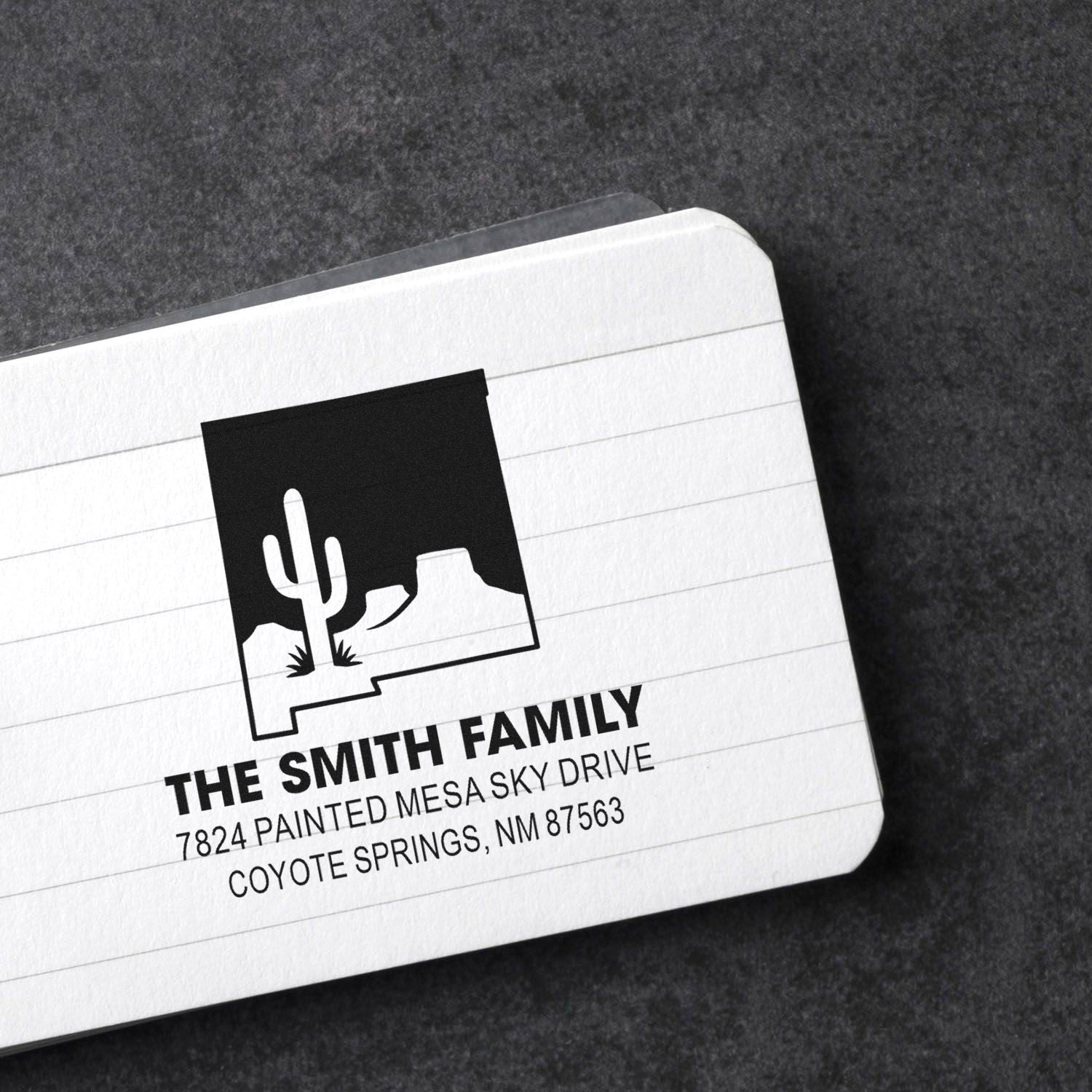 Custom rubber stamp for return address with cactus design, featuring The Smith Family and Coyote Springs, New Mexico.