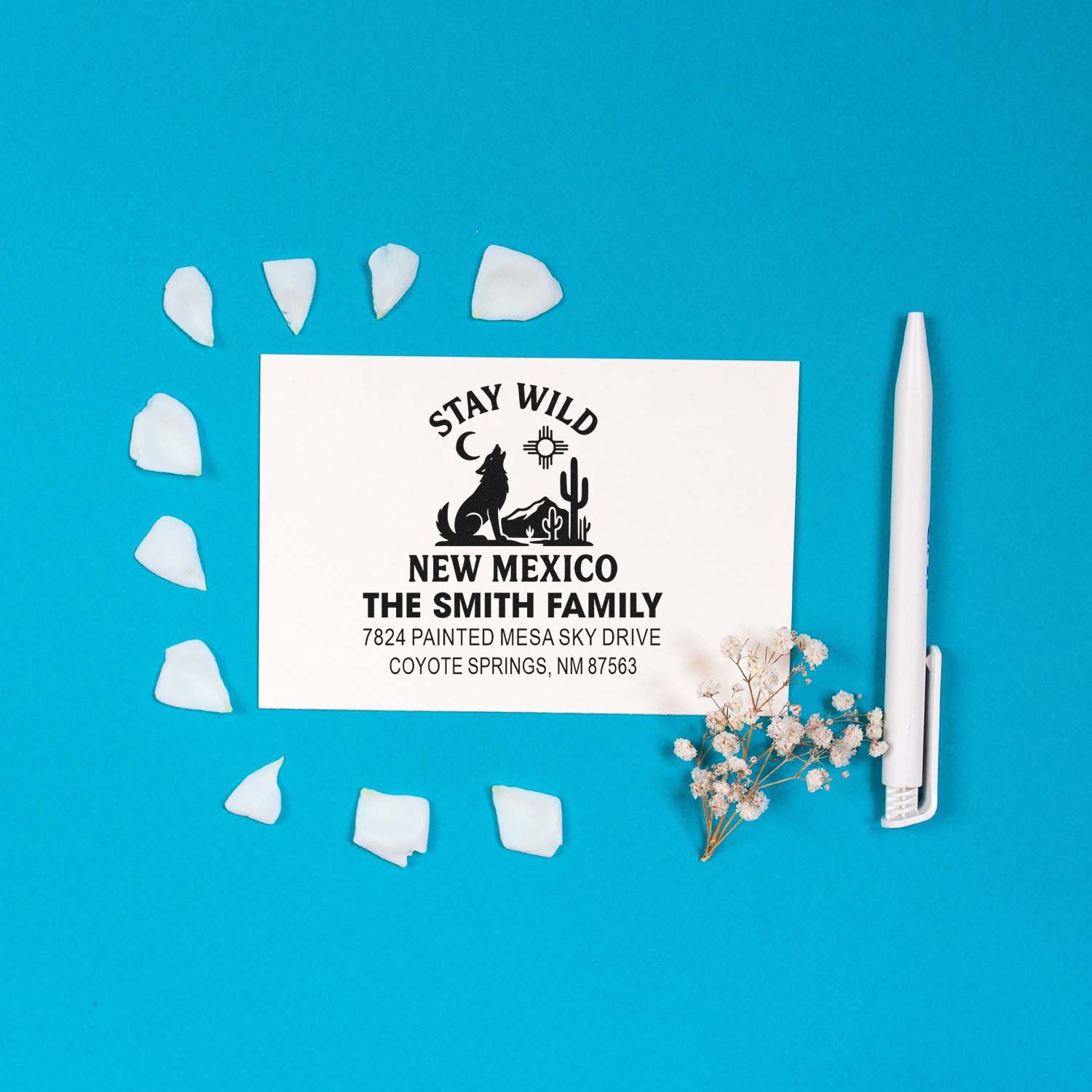Custom return address rubber stamp for The Smith Family, New Mexico, with a stay wild desert design.