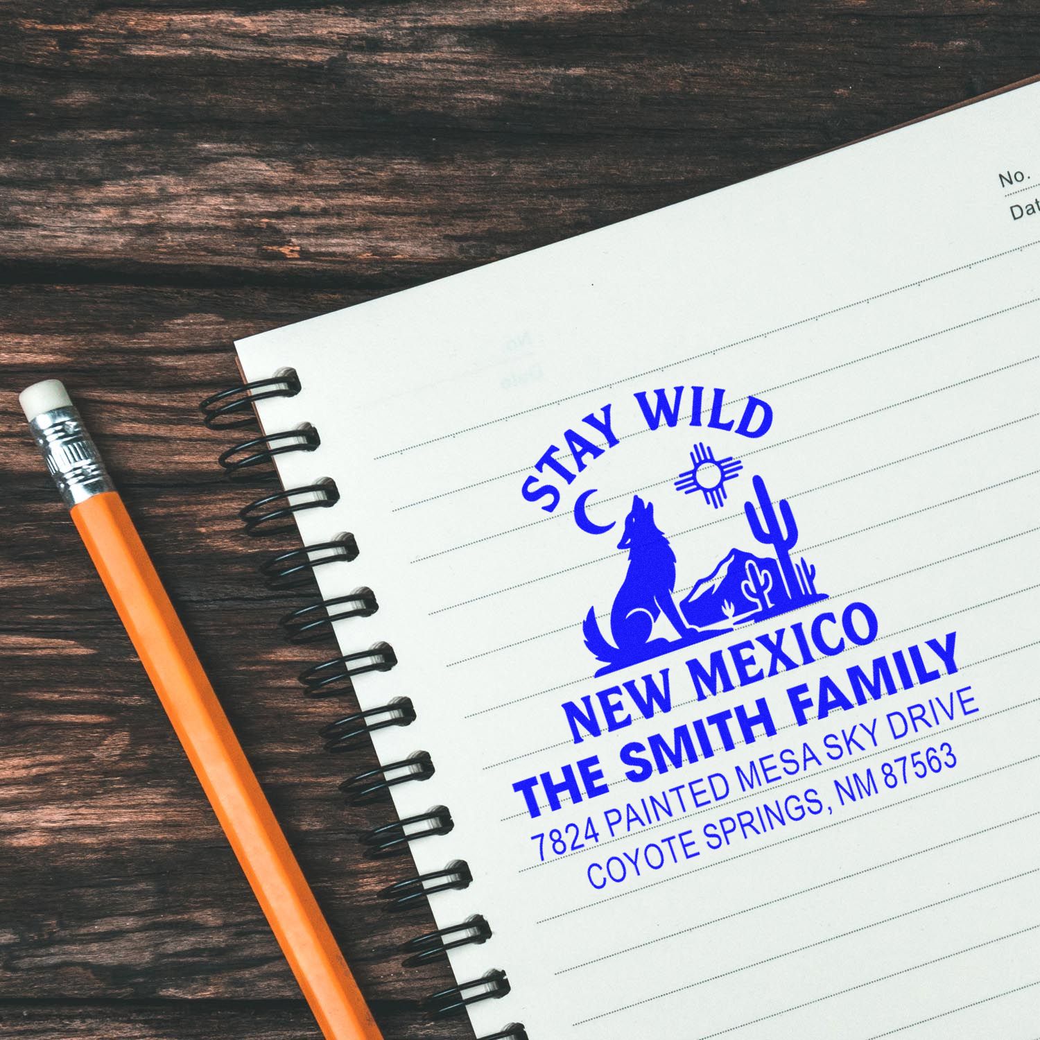 Custom rubber address stamp for family mailers, featuring a Stay Wild New Mexico return address design.