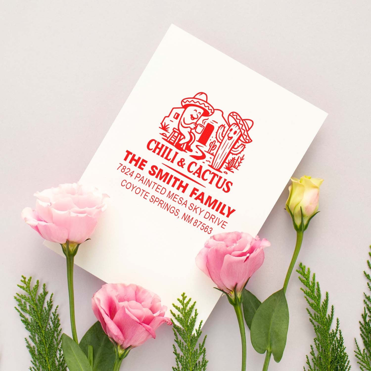 Personalized custom rubber return address stamp for The Smith Family with chili and cactus design on stationery