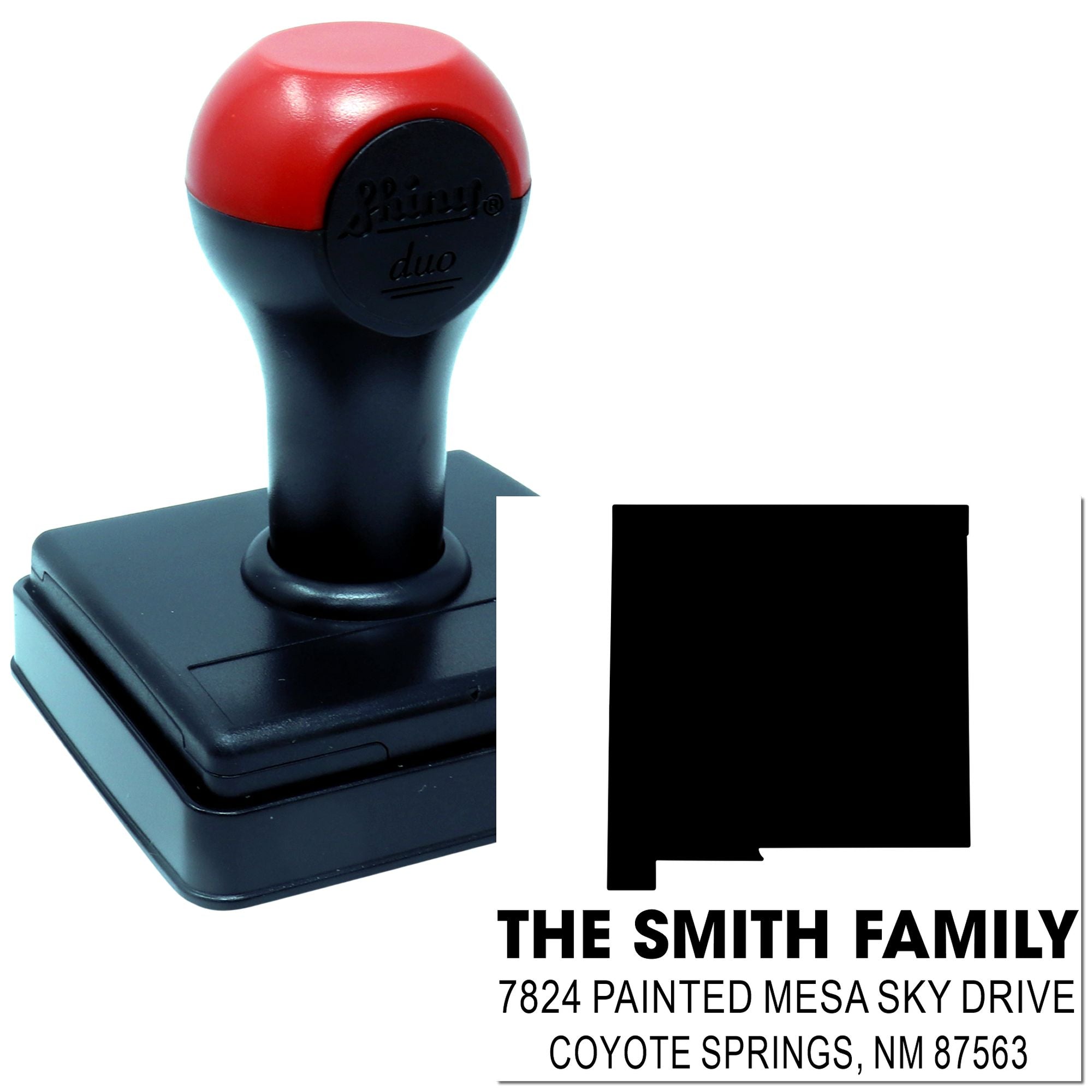 Custom self-inking address rubber stamp with family name and return address for envelopes and correspondence.