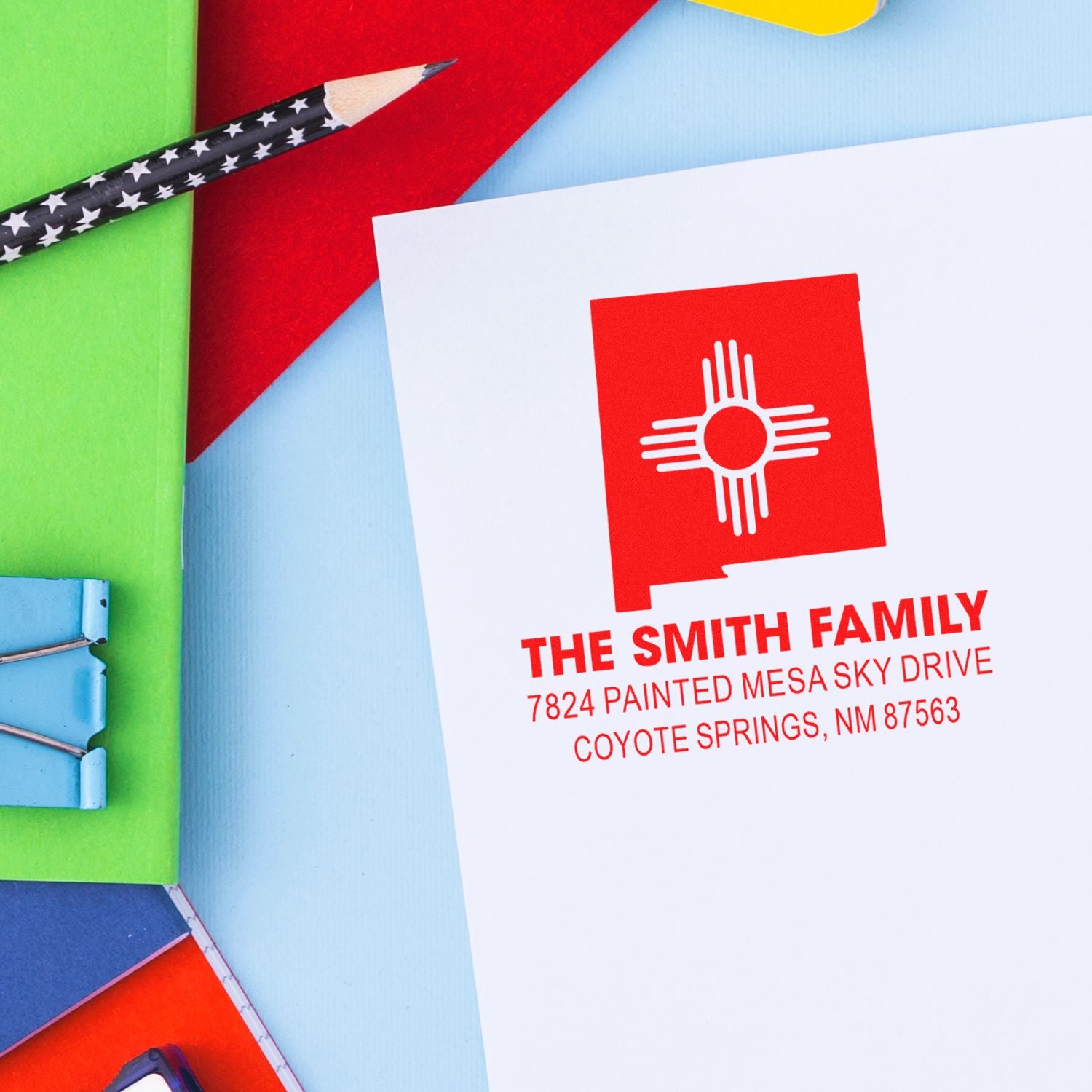 Custom return address rubber stamp for The Smith Family with New Mexico Zia symbol for envelopes and stationery