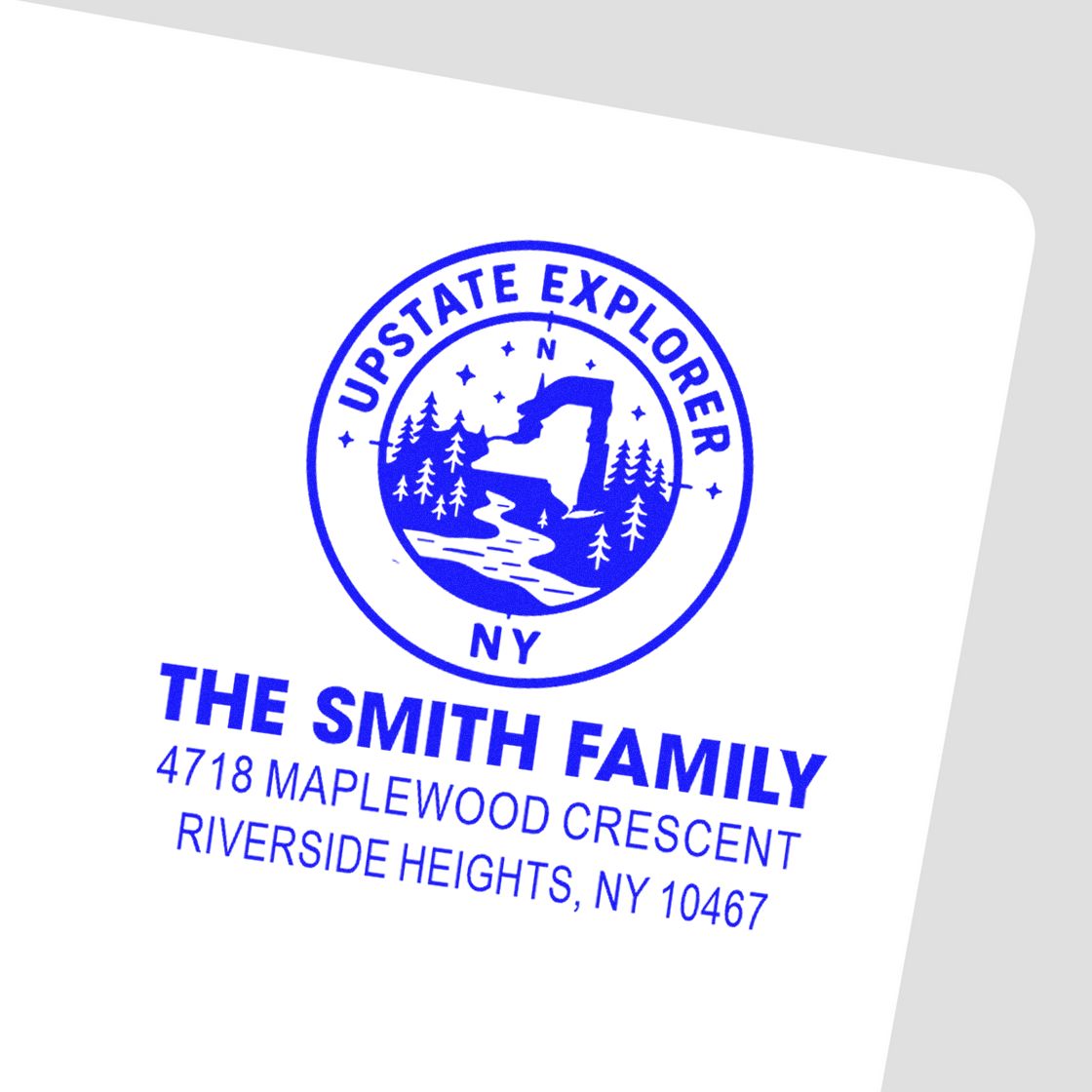 Custom rubber address stamp for The Smith Family, Riverside Heights, NY, with Upstate Explorer logo.
