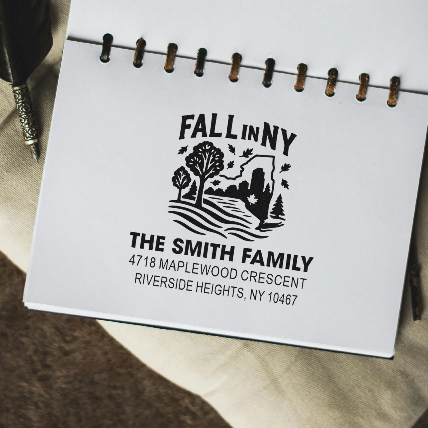 Custom rubber stamp with Fall in NY design, The Smith Family name, and Riverside Heights, NY return address.