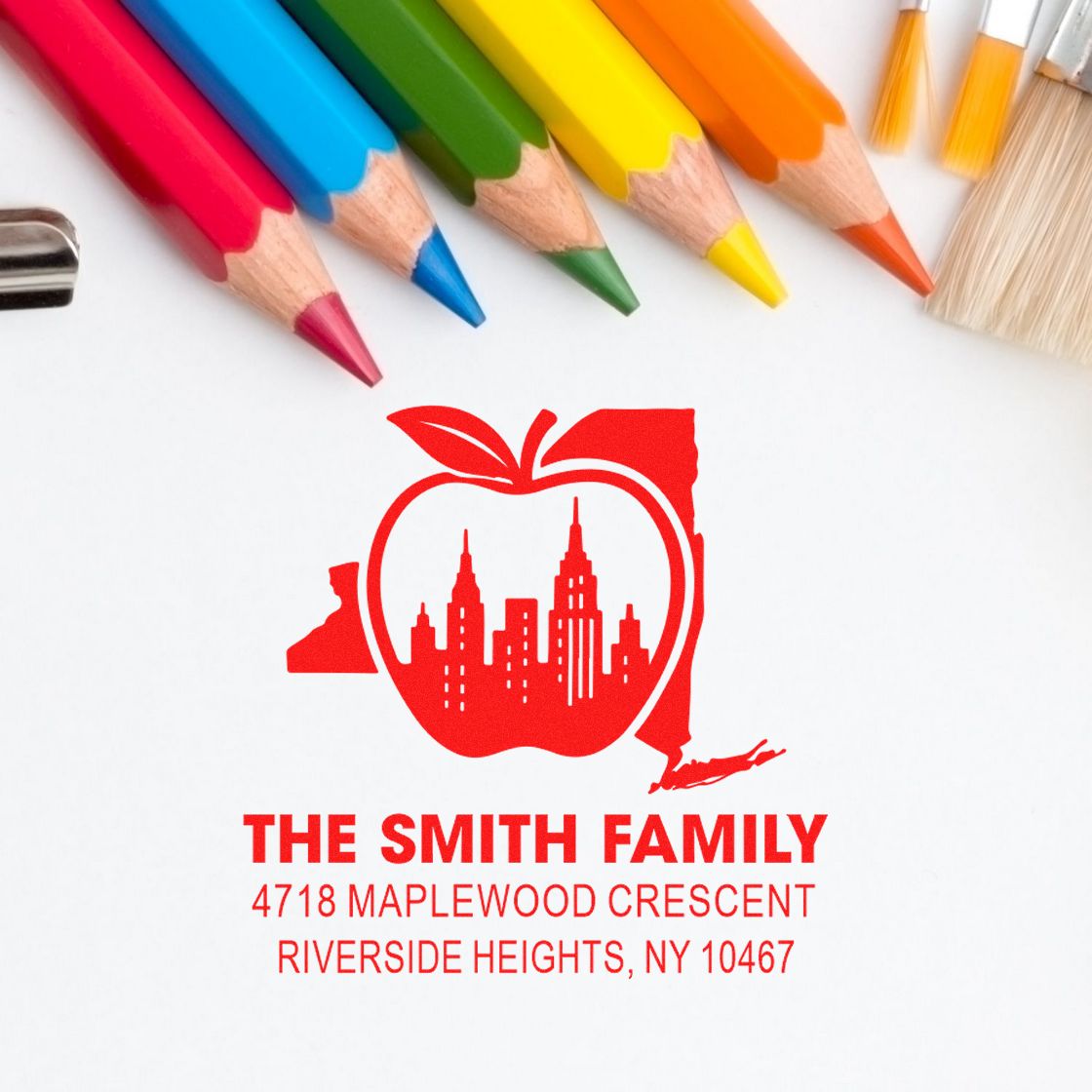Custom rubber stamp design with apple skyline logo, featuring The Smith Family and Riverside Heights, NY address.