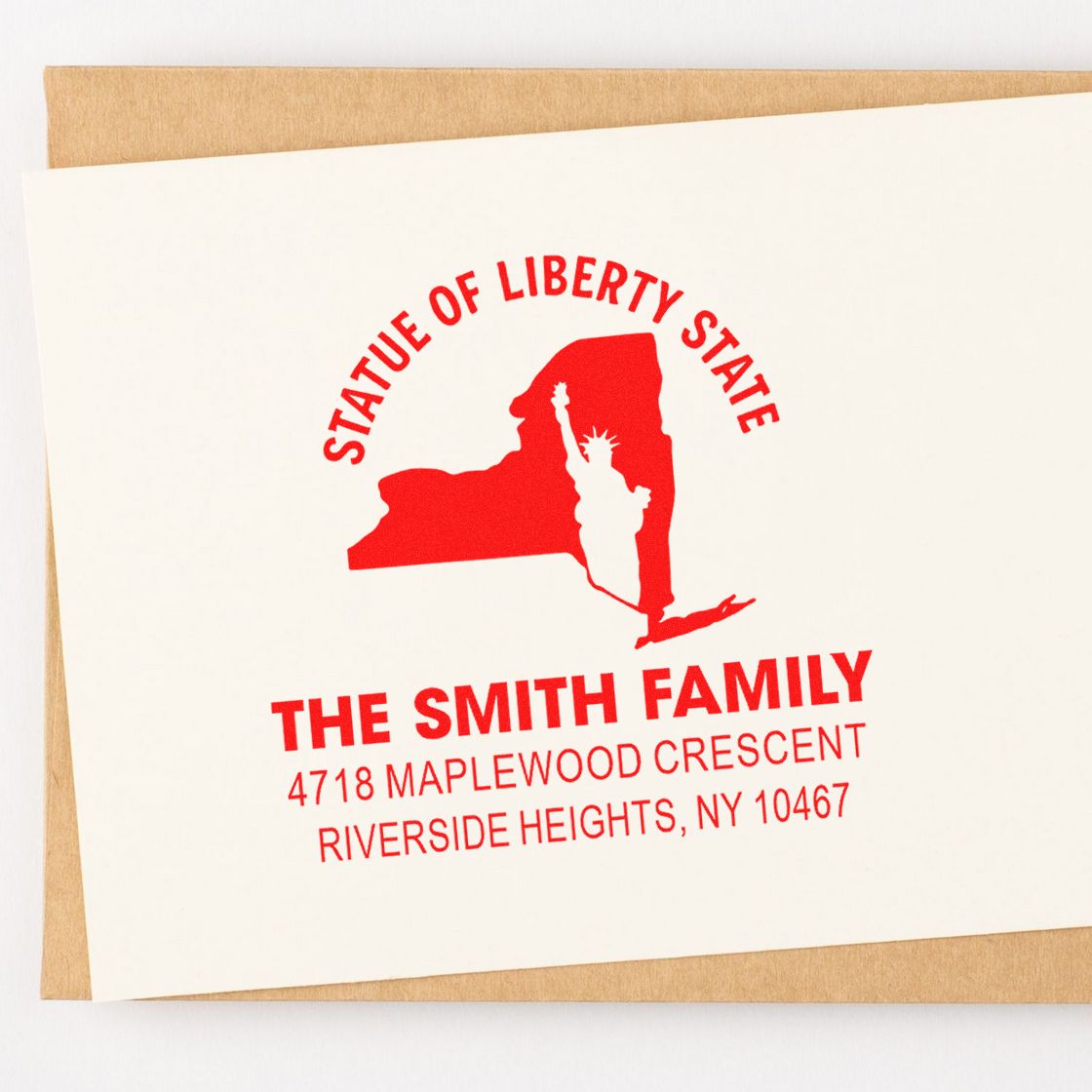 Custom rubber address stamp with New York State Statue of Liberty design and The Smith Family return address.