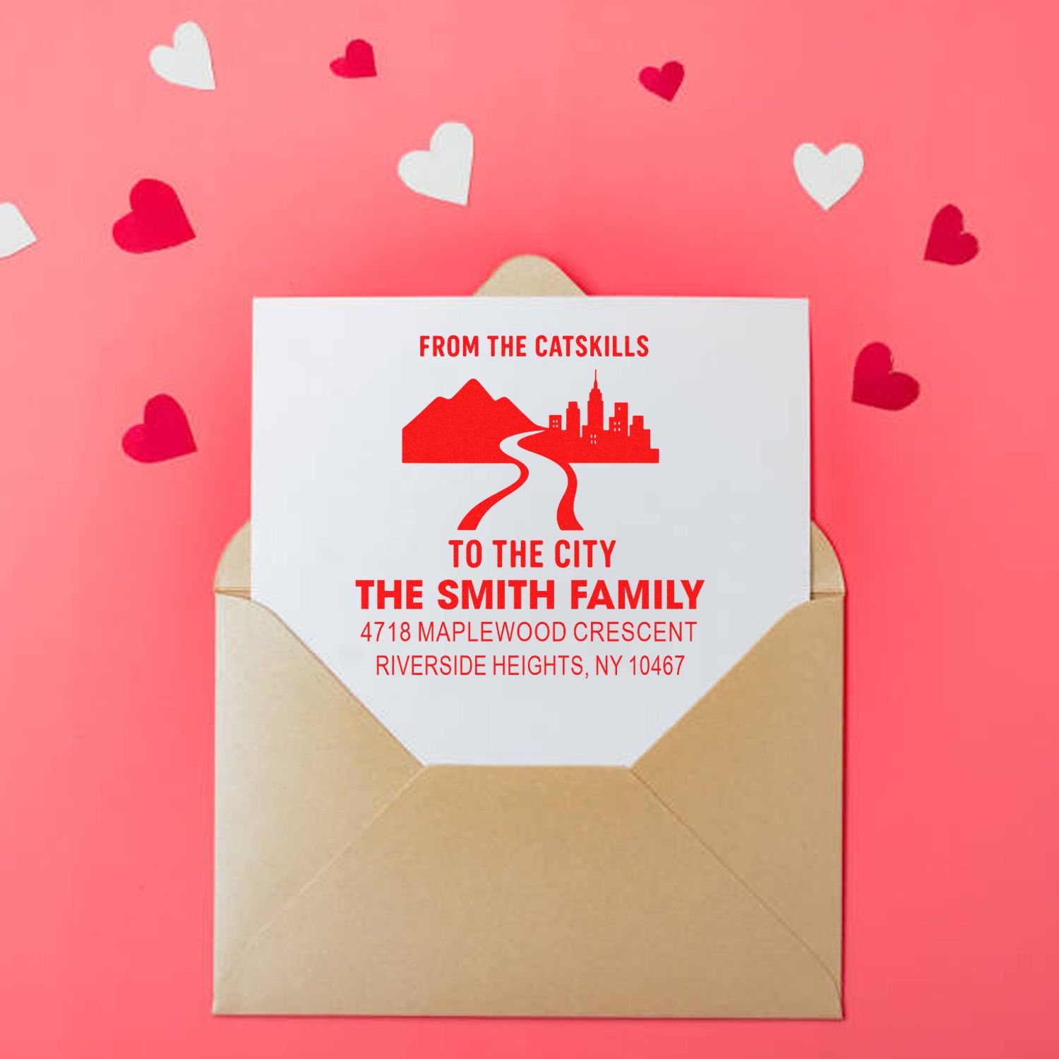 Custom rubber address stamp on envelope with From the Catskills to the City family return address for personalized mail.