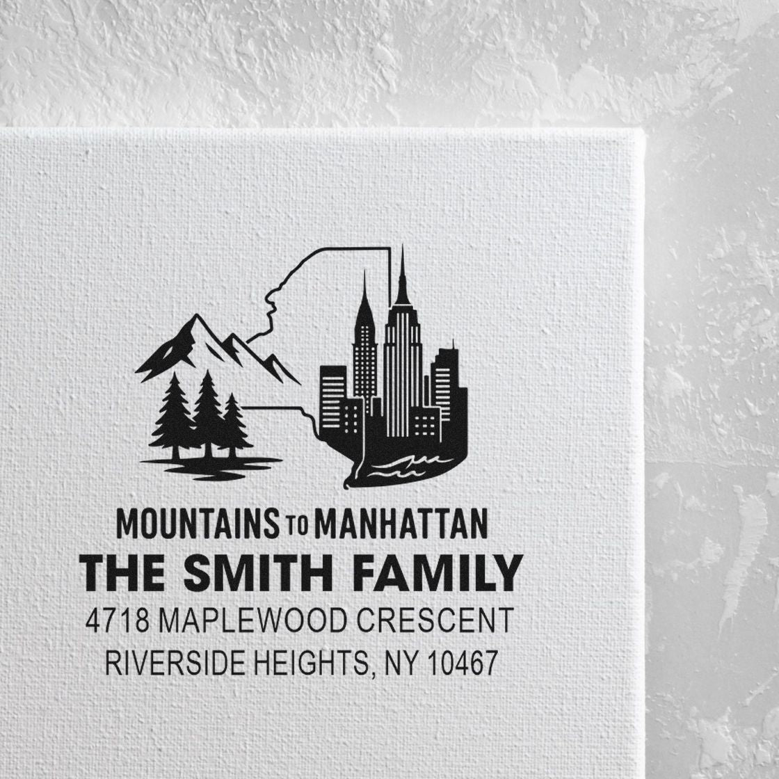 Personalized return address rubber stamp for The Smith Family, Mountains to Manhattan logo, Riverside Heights NY 10467.