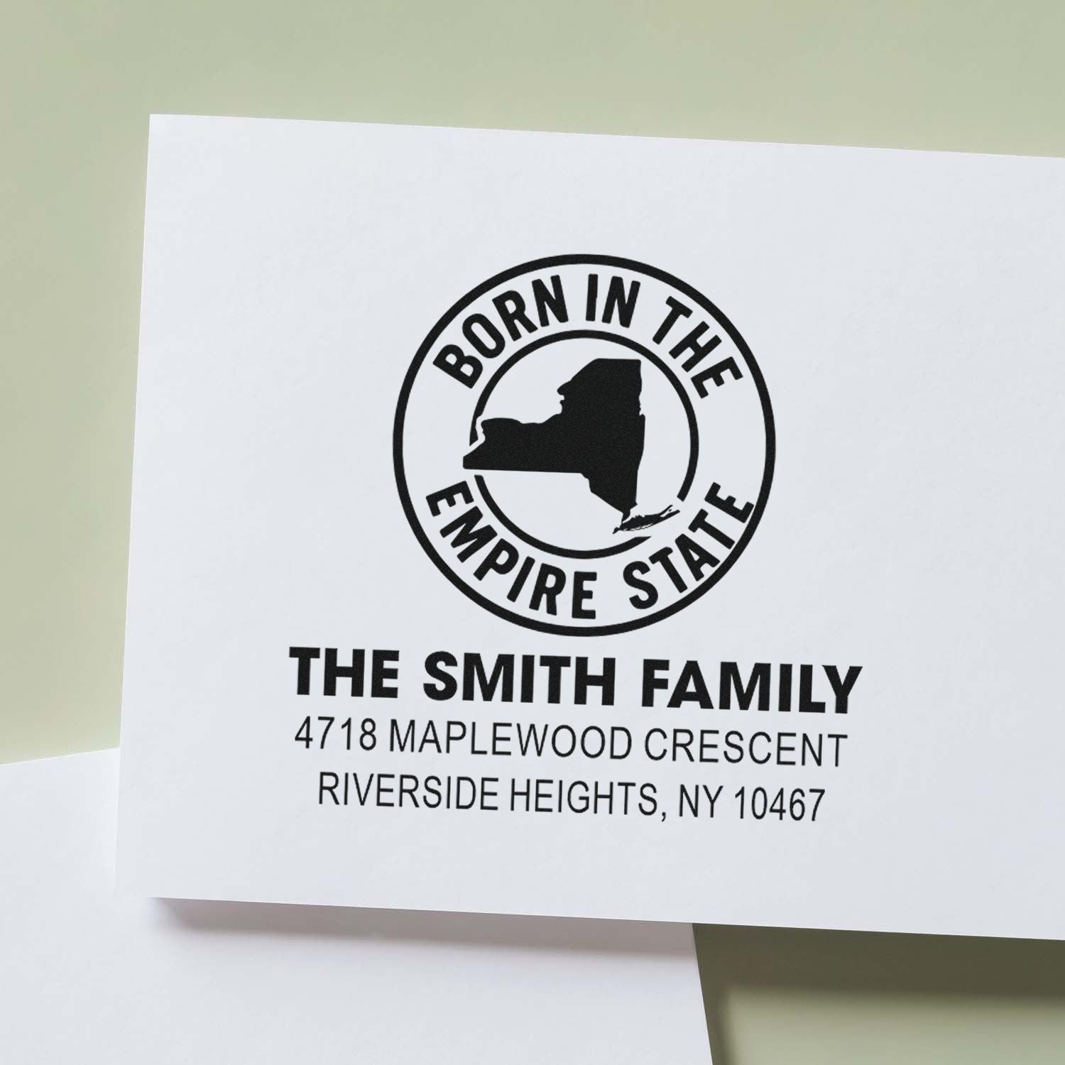 Custom rubber address stamp for The Smith Family with Born in the Empire State logo and Riverside Heights, NY address.