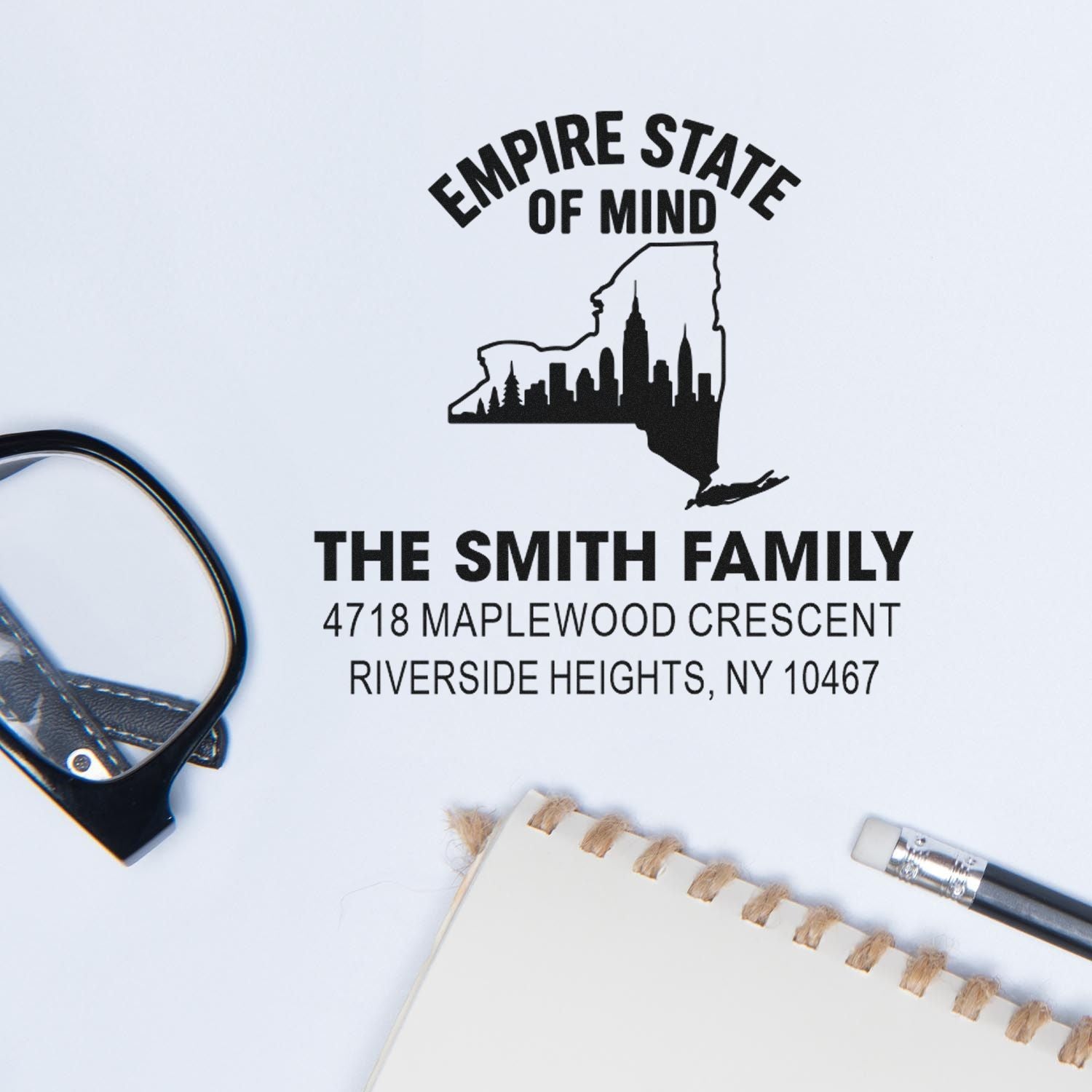 Custom New York return address rubber stamp for The Smith Family, featuring state outline and personalized mailing details.