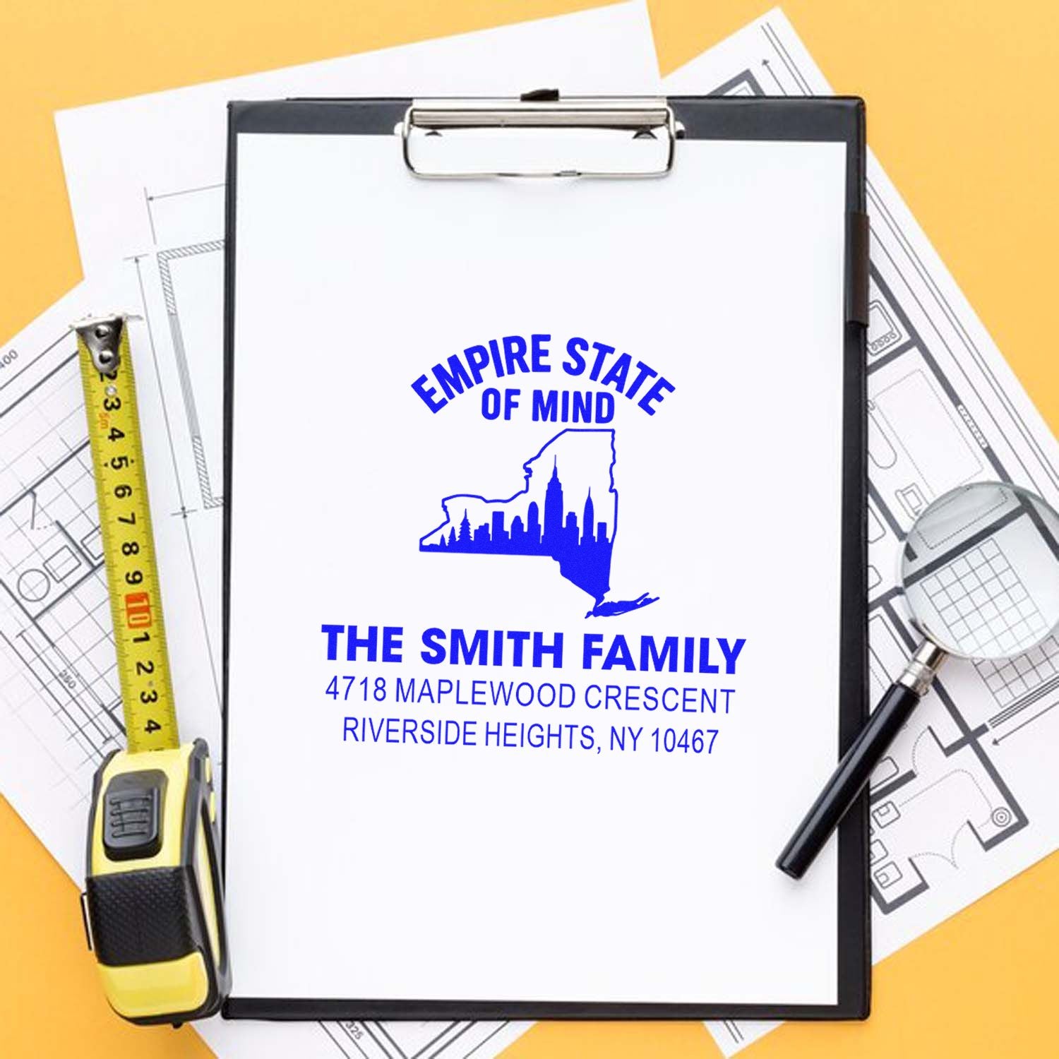 Custom New York rubber address stamp for The Smith Family, featuring Empire State of Mind design for mailings.