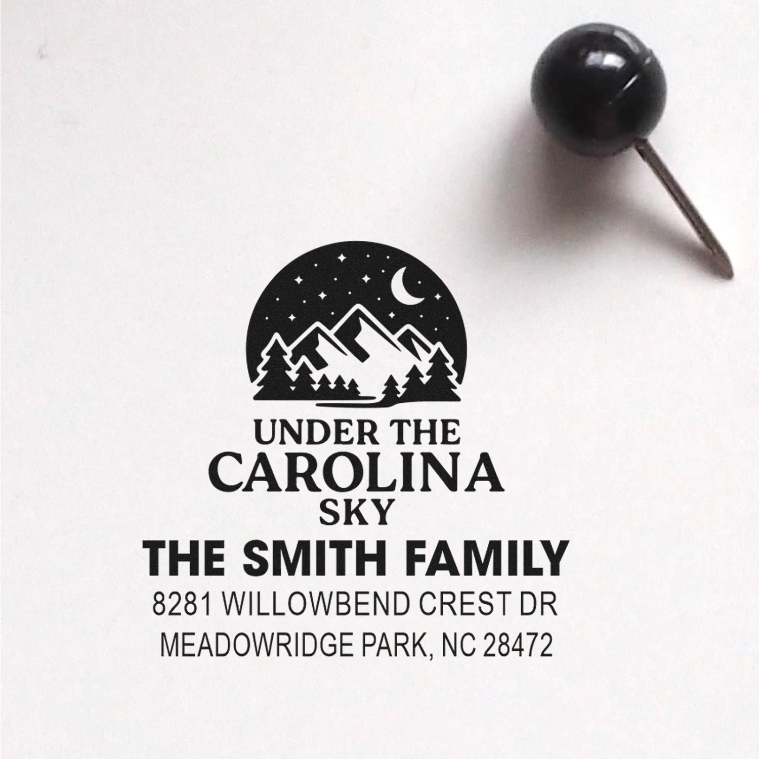 Custom return address rubber stamp with mountain and moon logo, personalized for The Smith Family in Meadowridge Park, NC.