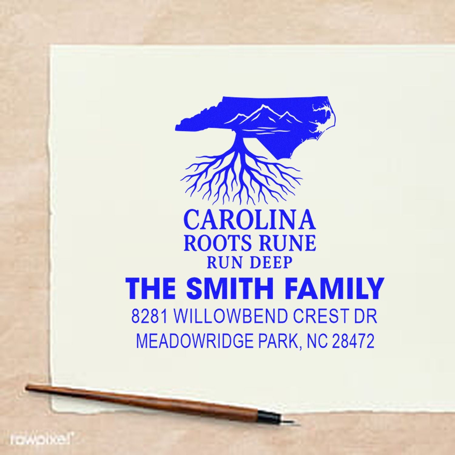 Custom North Carolina family return address rubber stamp with roots design for The Smith Family stationery and mail.