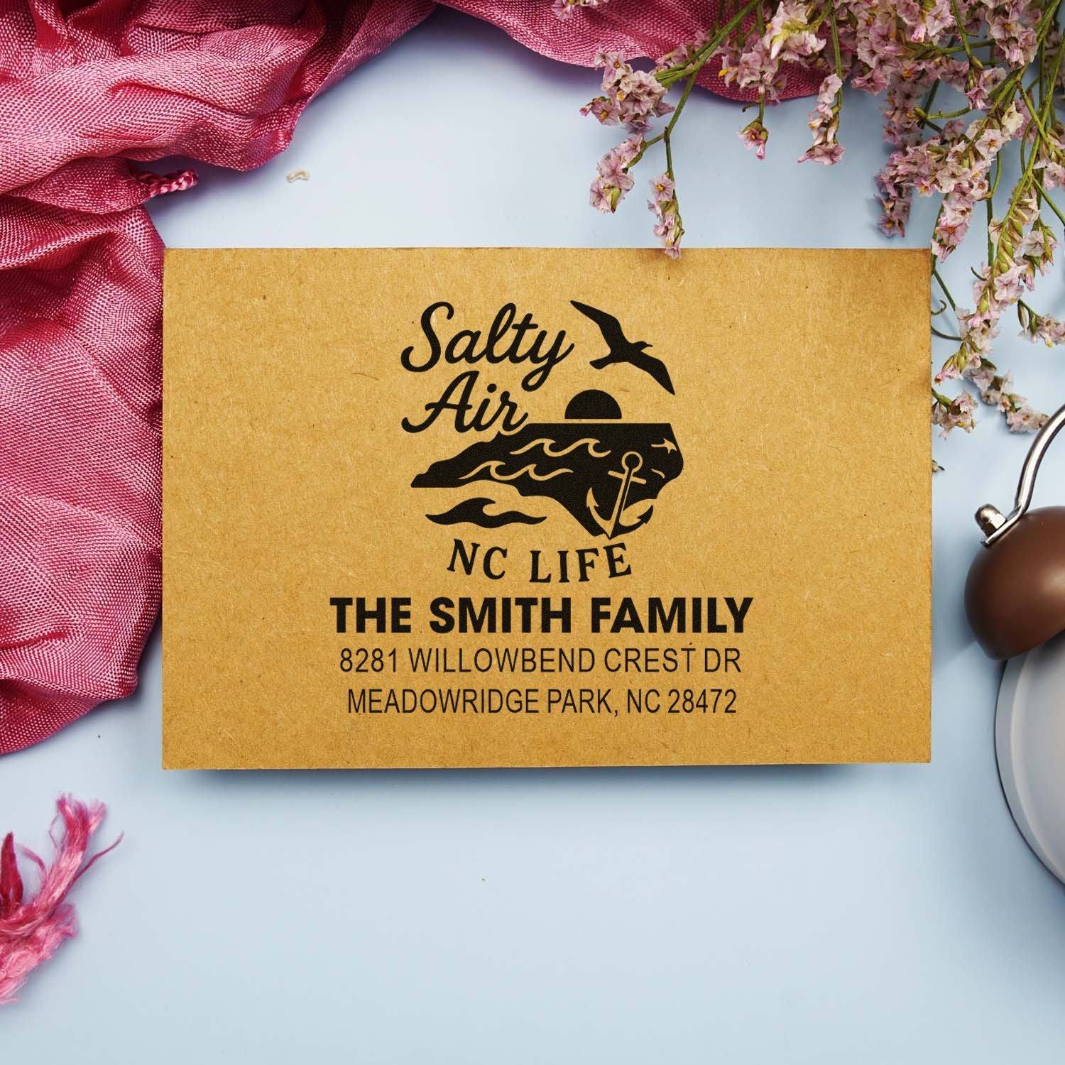 Custom coastal return address rubber stamp for The Smith Family with Salty Air NC Life design on kraft paper.