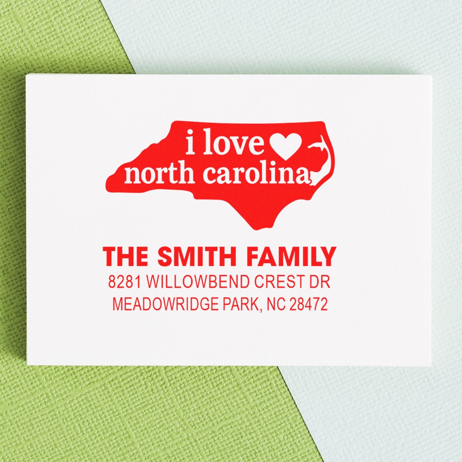 Custom North Carolina address rubber stamp for The Smith Family with heart state design and Meadowridge Park NC address.