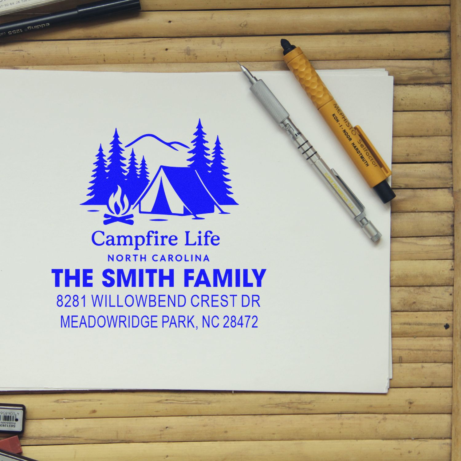 Custom return address rubber stamp with camping tent and trees for The Smith Family, Campfire Life North Carolina.