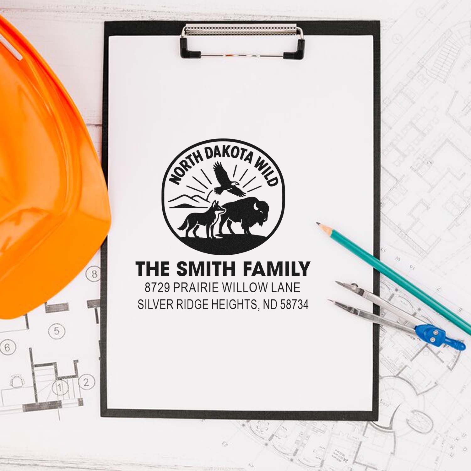 Custom return address rubber stamp for The Smith Family with North Dakota Wild logo and address