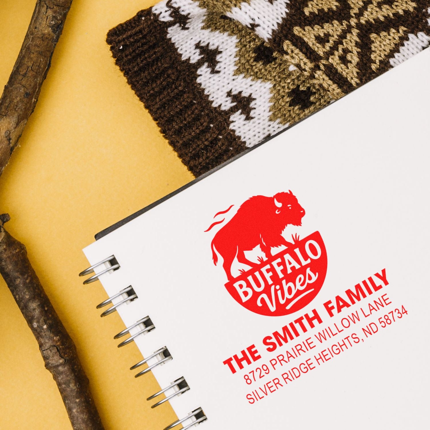 Custom Buffalo Vibes family address rubber stamp on notebook, ideal for rustic branding and personalized mailings.