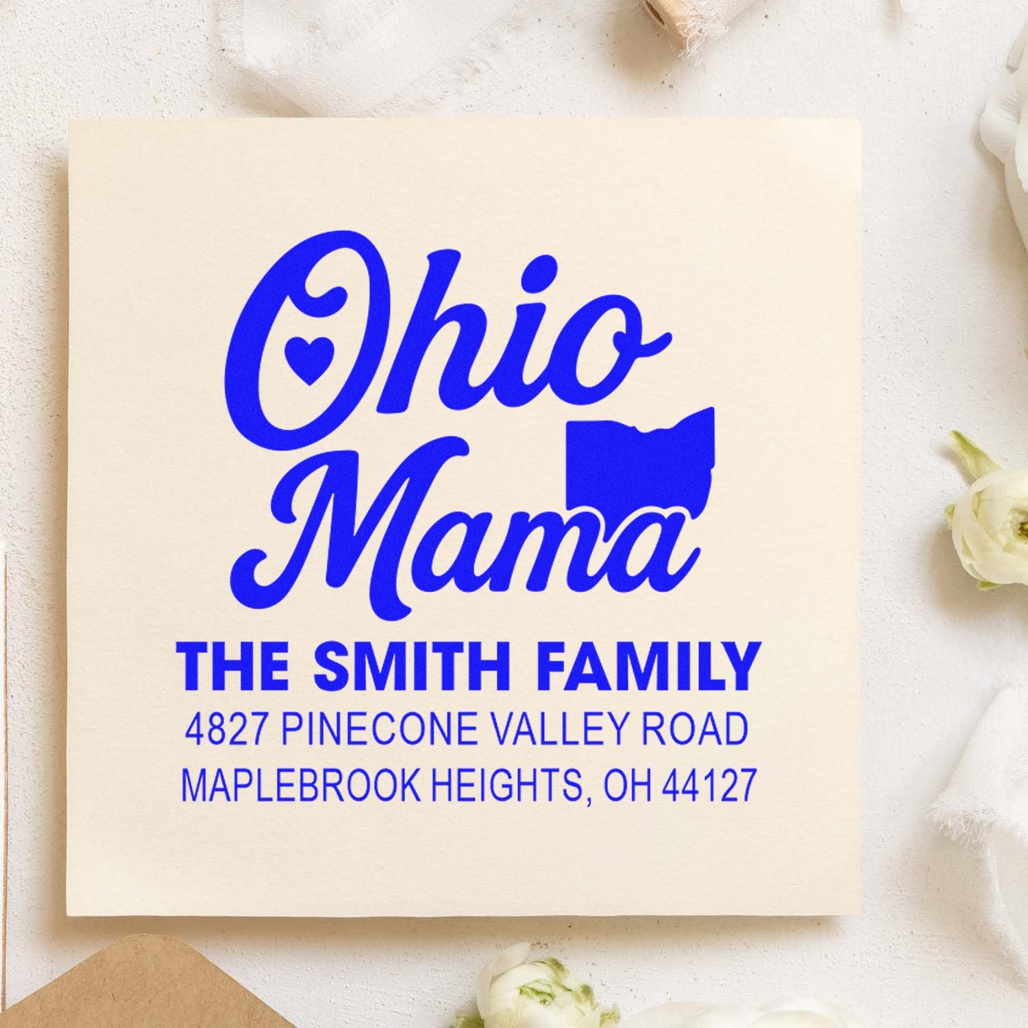 Custom Ohio Mama rubber stamp with family name and return address for personalized envelopes and stationery.