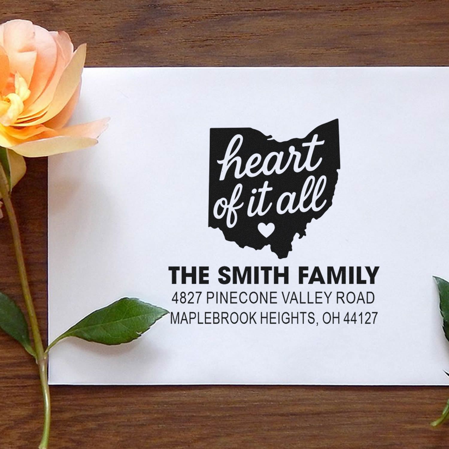 Custom Ohio family address rubber stamp with Heart of It All design for The Smith Family return mail.