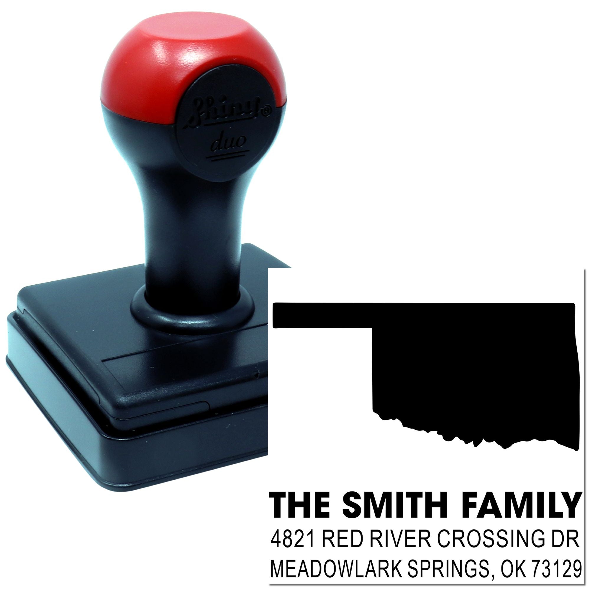 Custom self-inking address rubber stamp with family name and return address imprint.