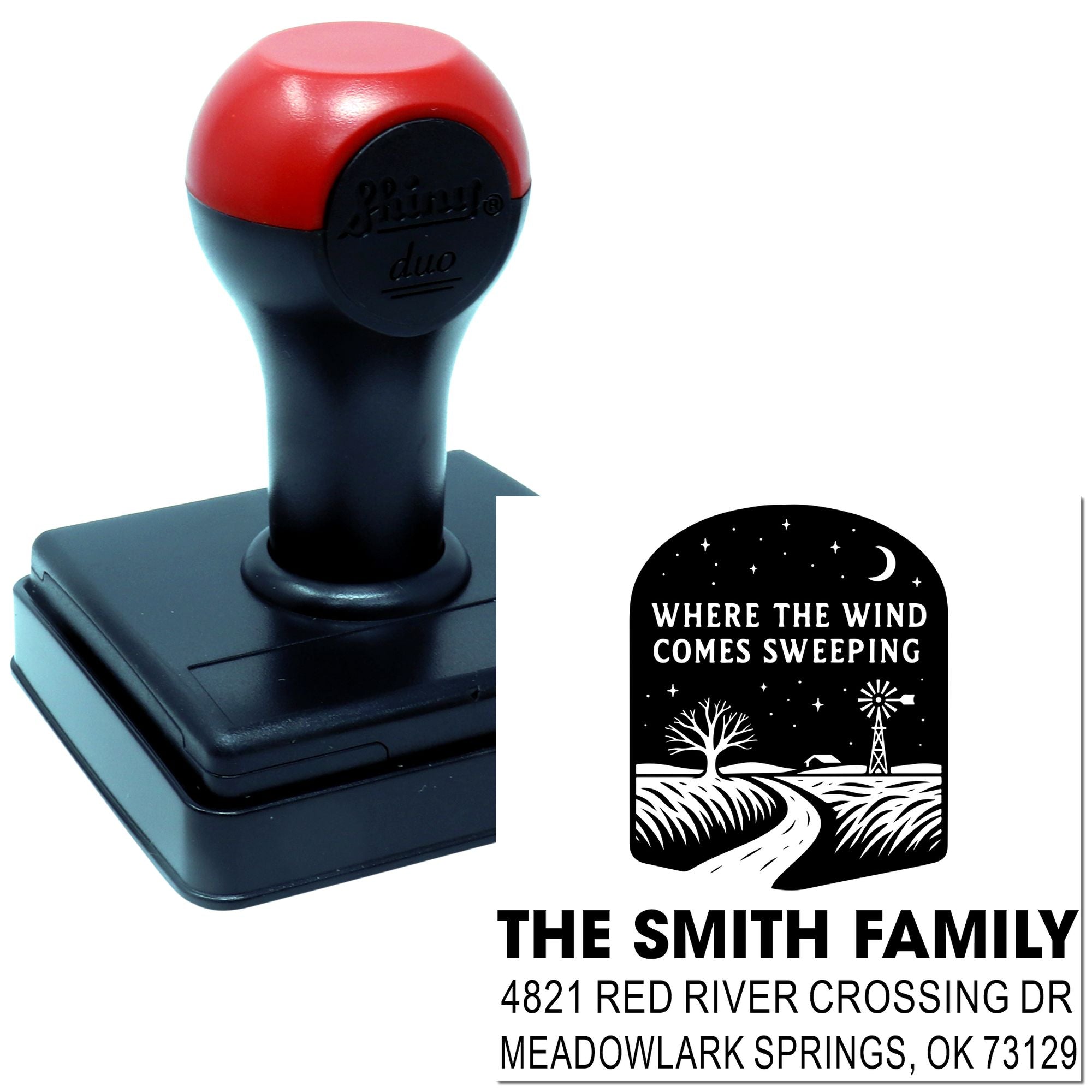 Custom self-inking rubber address stamp with windmill design, showing The Smith Family return address imprint.