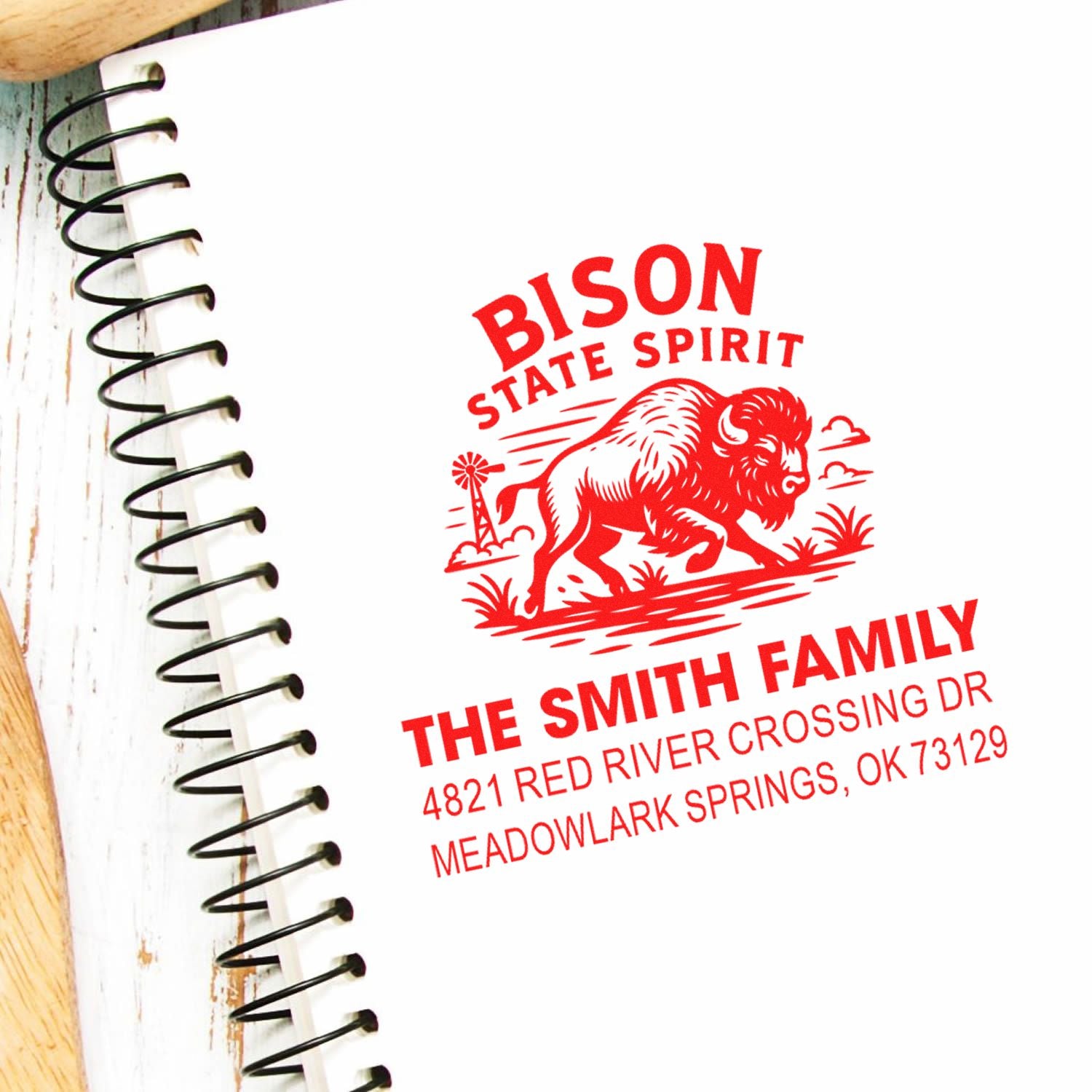 Custom rubber stamp with bison design and Smith family address for personalized stationery and mailings.