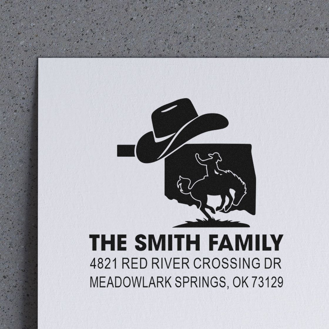 Custom return address rubber stamp with cowboy ranch logo for The Smith Family, Meadowlark Springs, OK.